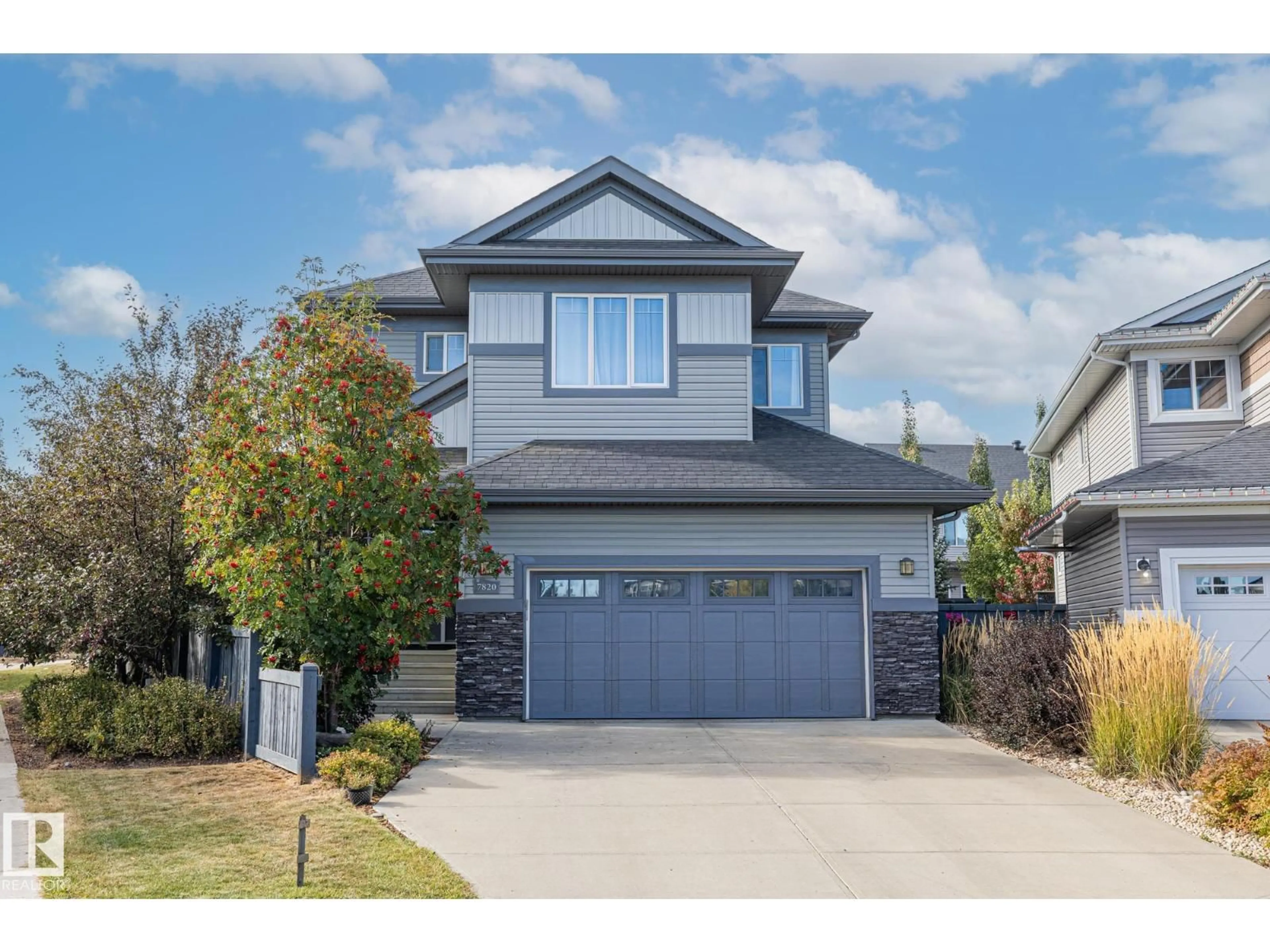 Home with vinyl exterior material, street for NW - 7820 GETTY WD, Edmonton Alberta T5T7A9