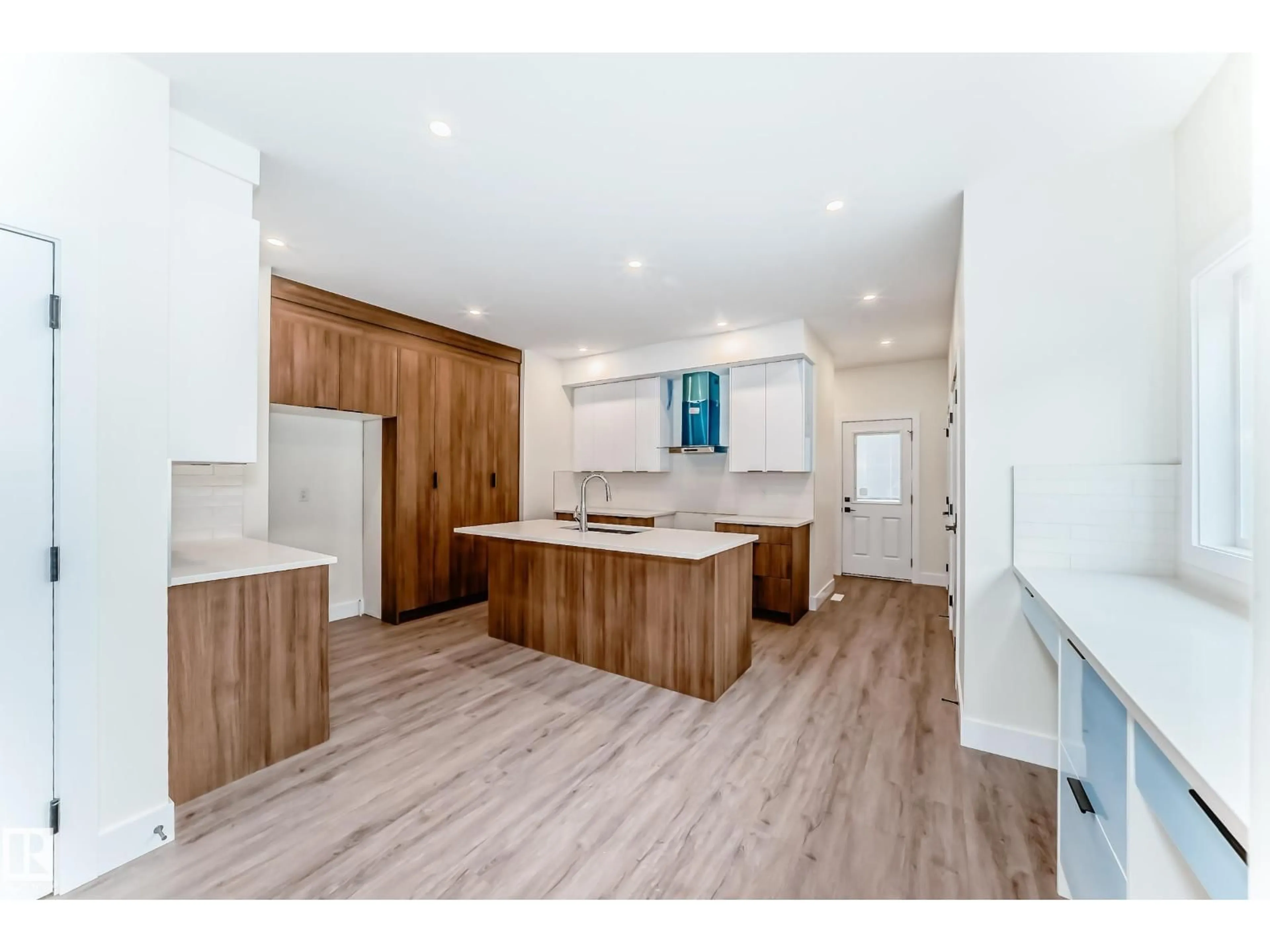 Open concept kitchen, wood/laminate floor for NW - 10720 149 ST, Edmonton Alberta T5P1M2