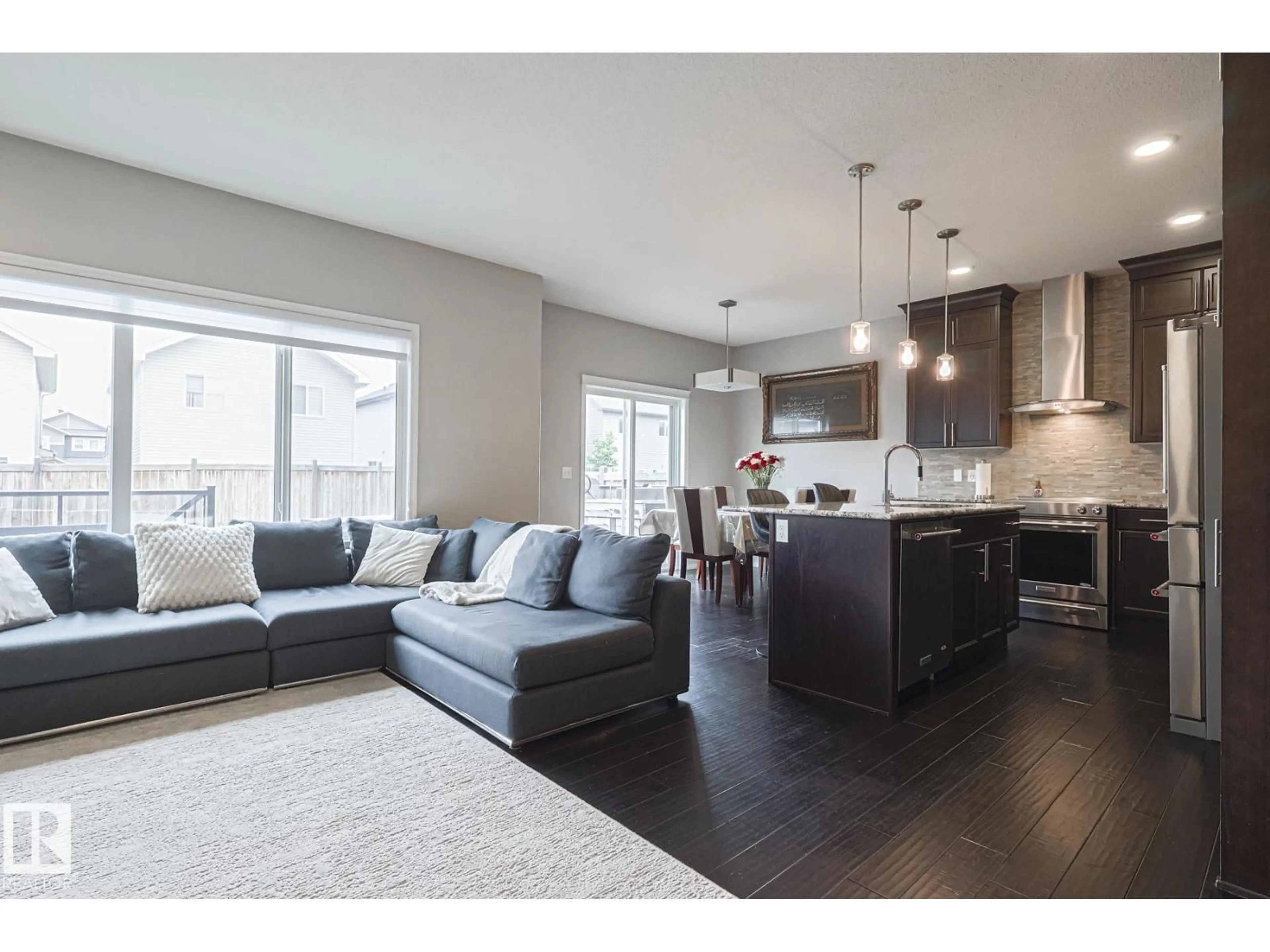 Open concept kitchen, wood/laminate floor for 17135 47 ST, Edmonton Alberta T5Y3P4