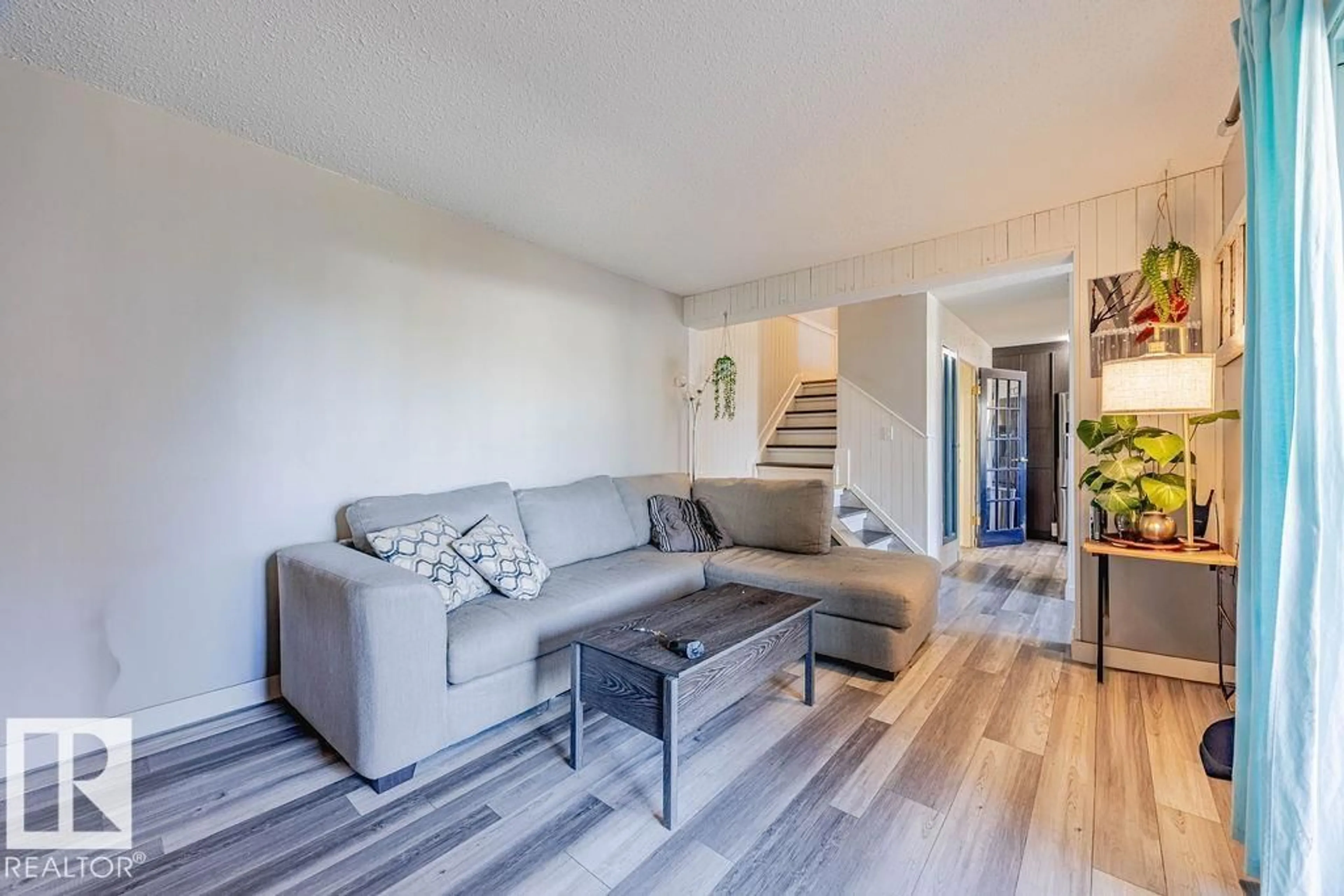 Living room with furniture, unknown for 8005 27 AV, Edmonton Alberta T6K3C9
