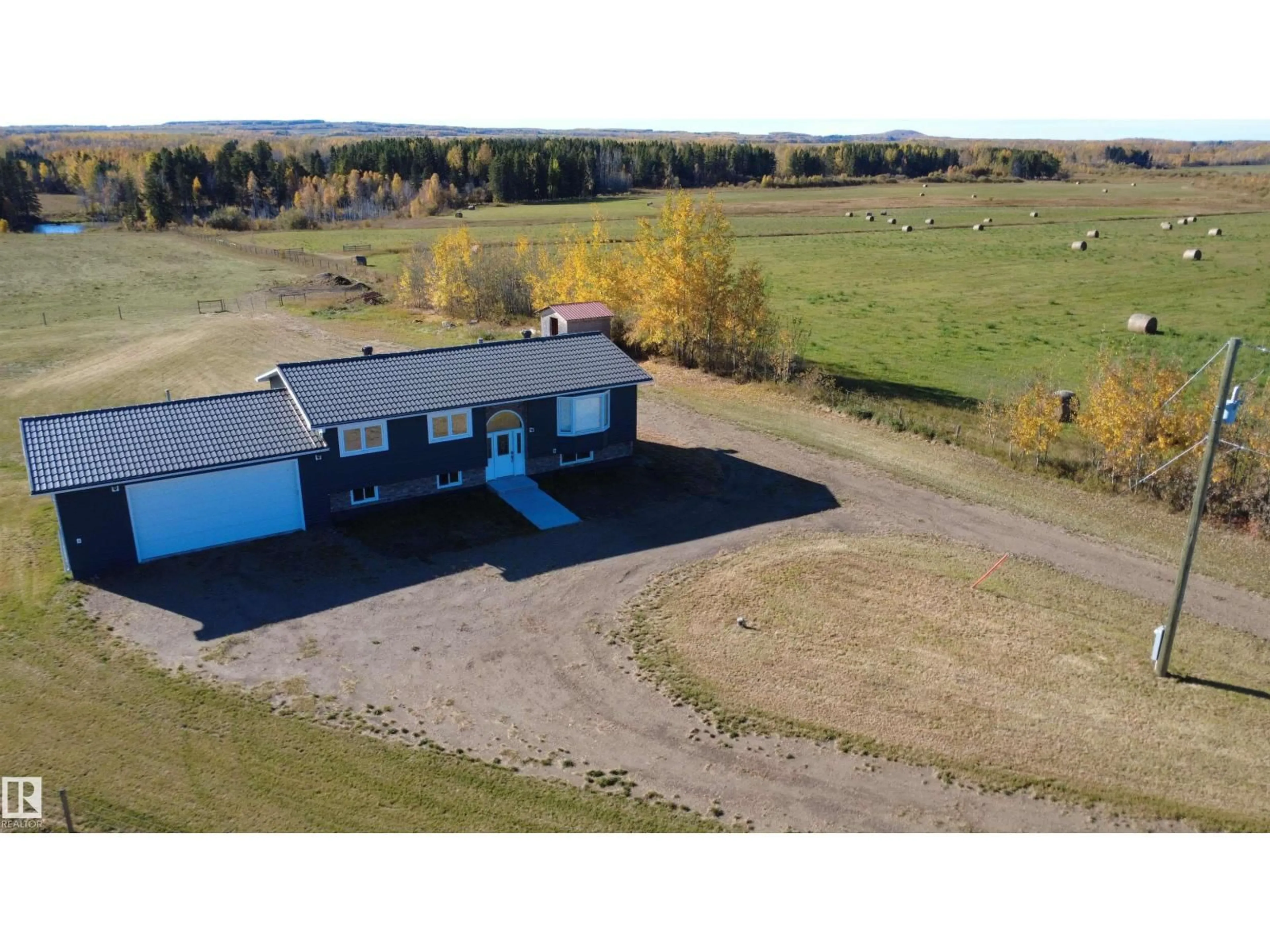 A pic from outside/outdoor area/front of a property/back of a property/a pic from drone, unknown for 5215 HWY 616, Rural Brazeau County Alberta T0C0W0