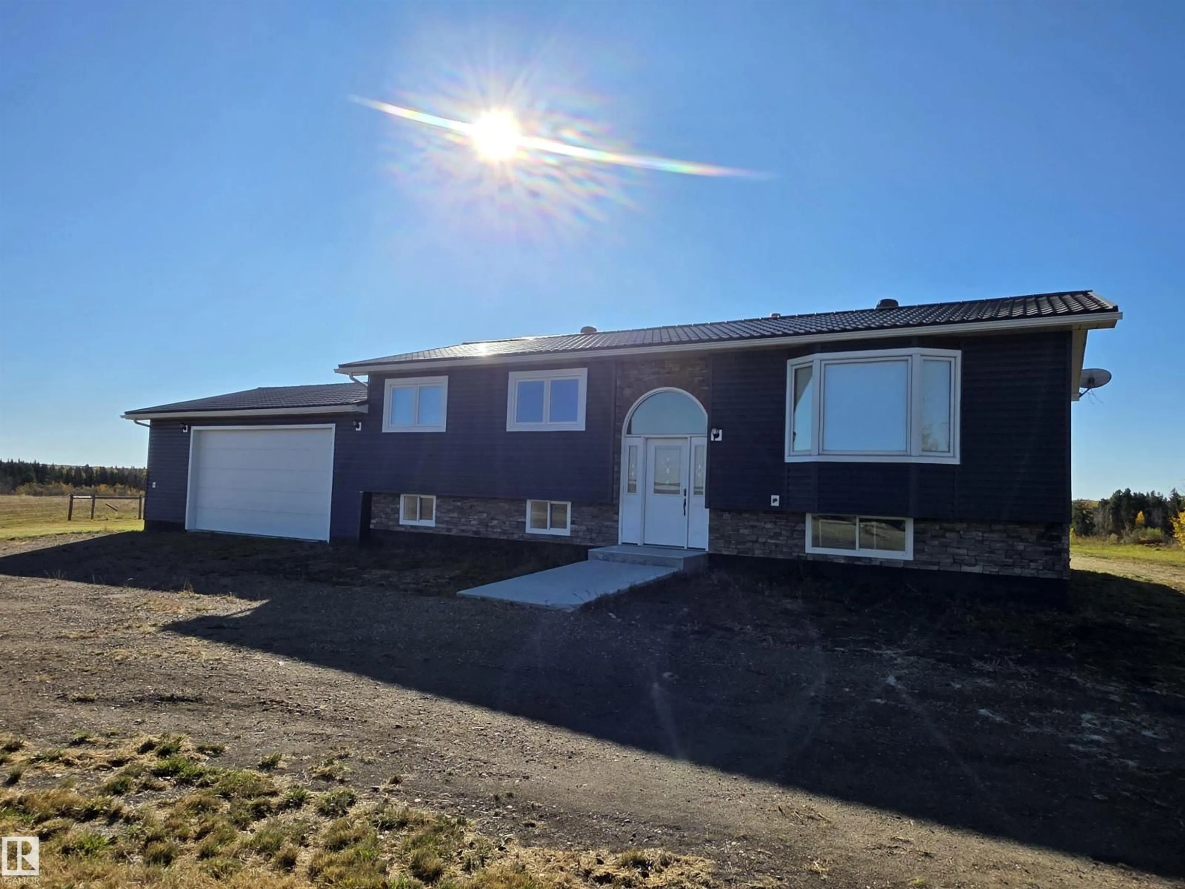 A pic from outside/outdoor area/front of a property/back of a property/a pic from drone, unknown for 5215 HWY 616, Rural Brazeau County Alberta T0C0W0