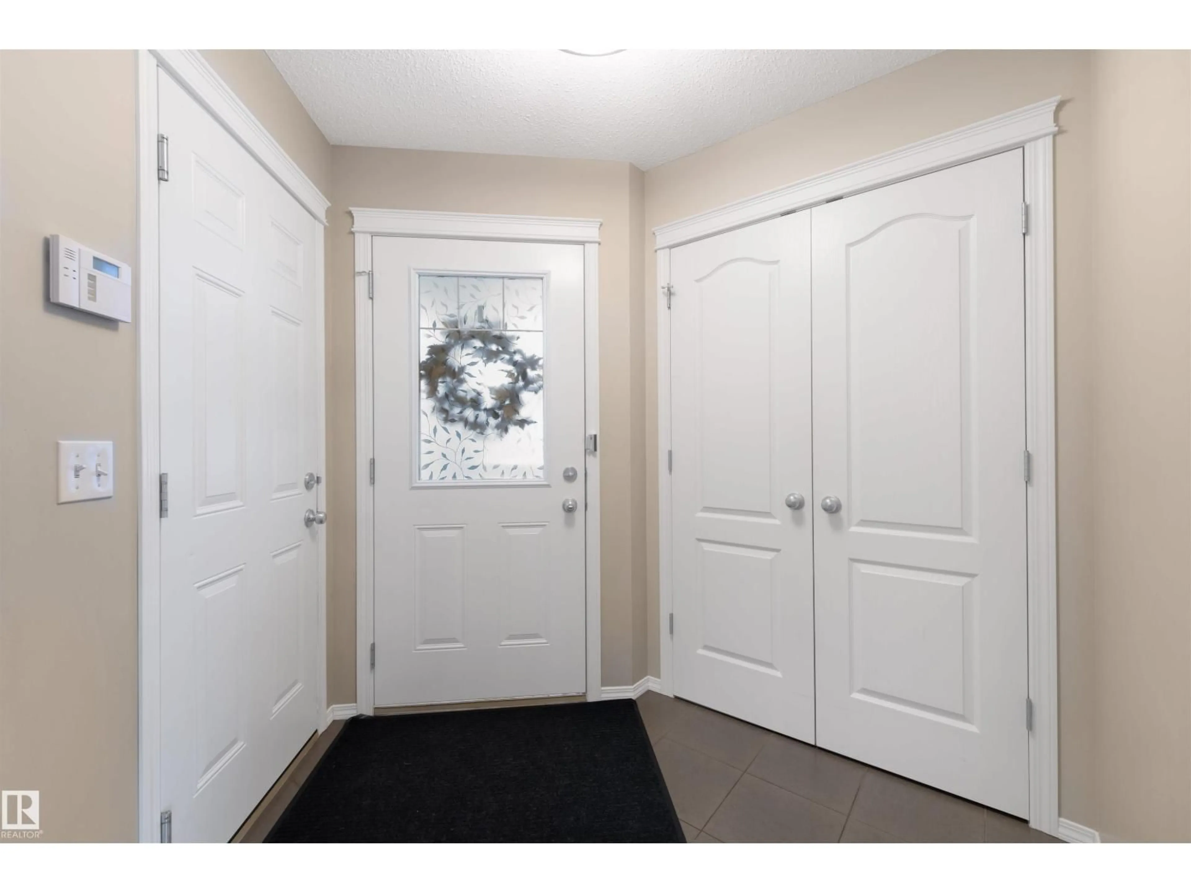 Indoor entryway for NW NW - 1728 HAMMOND CR, Edmonton Alberta T6M0N1