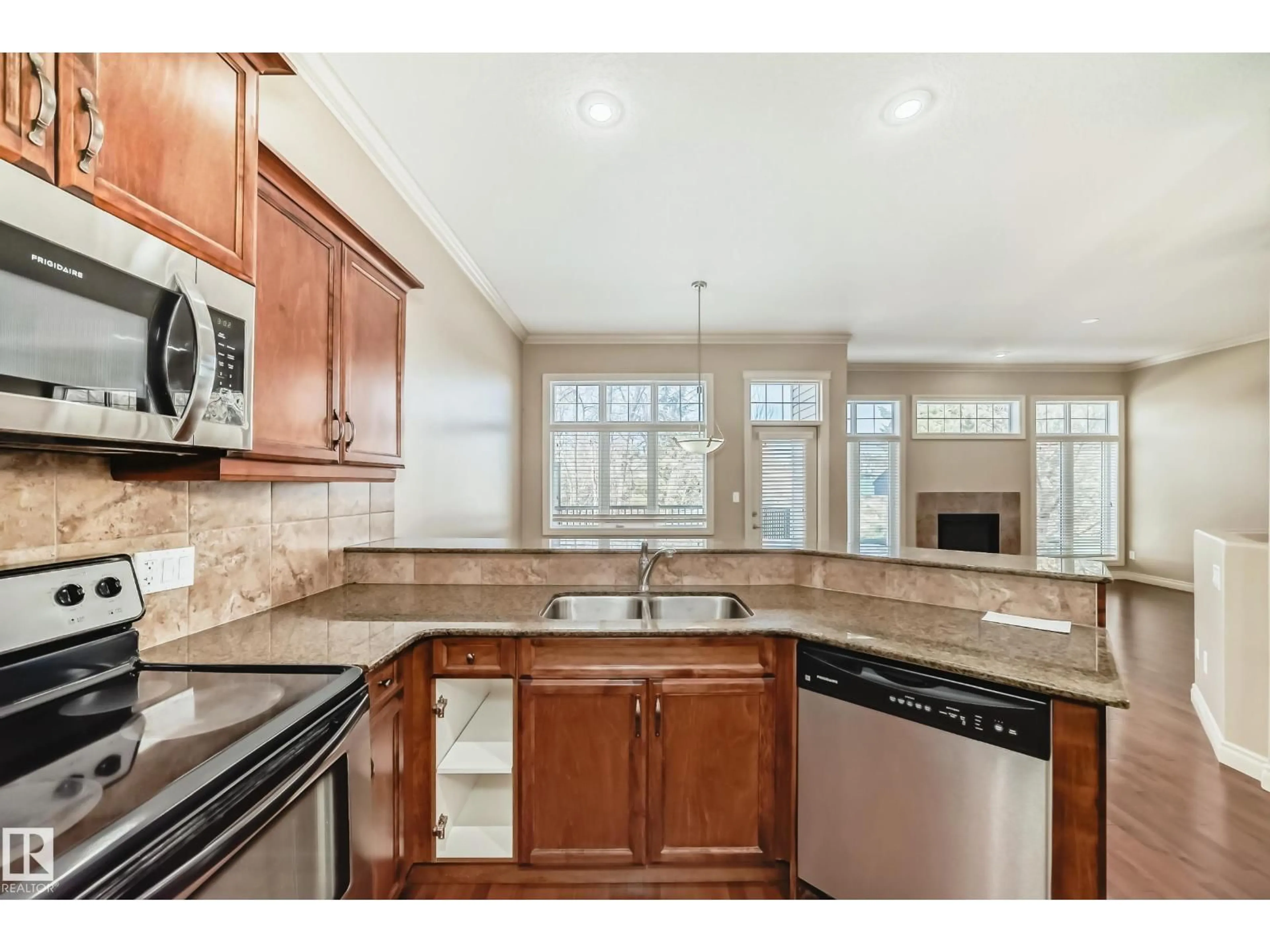 Open concept kitchen, ceramic/tile floor for #13 - 12610 15 AV, Edmonton Alberta T6W1X1