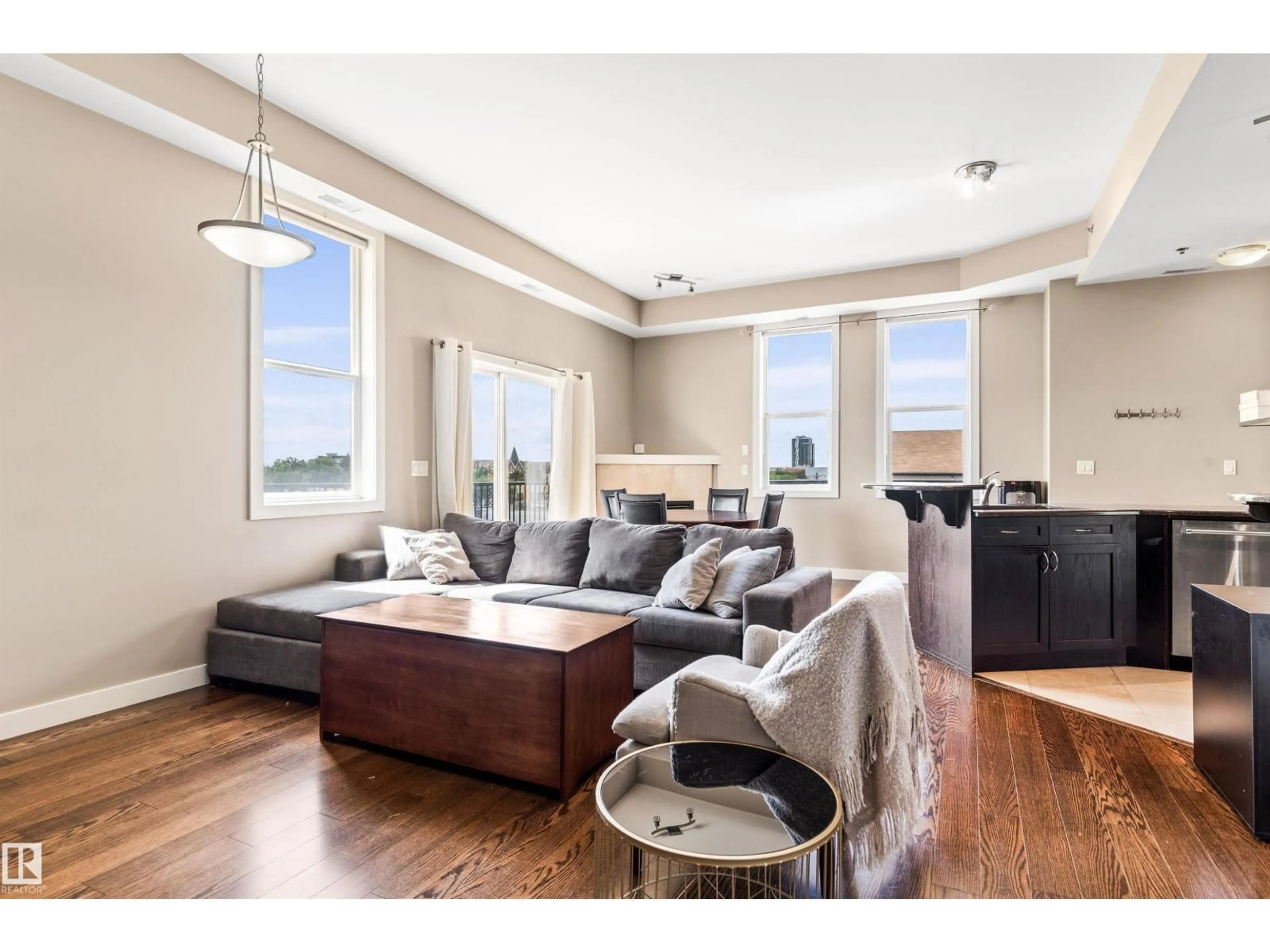 Living room with furniture, wood/laminate floor for 403 - 8223 99 ST, Edmonton Alberta T6E3T1