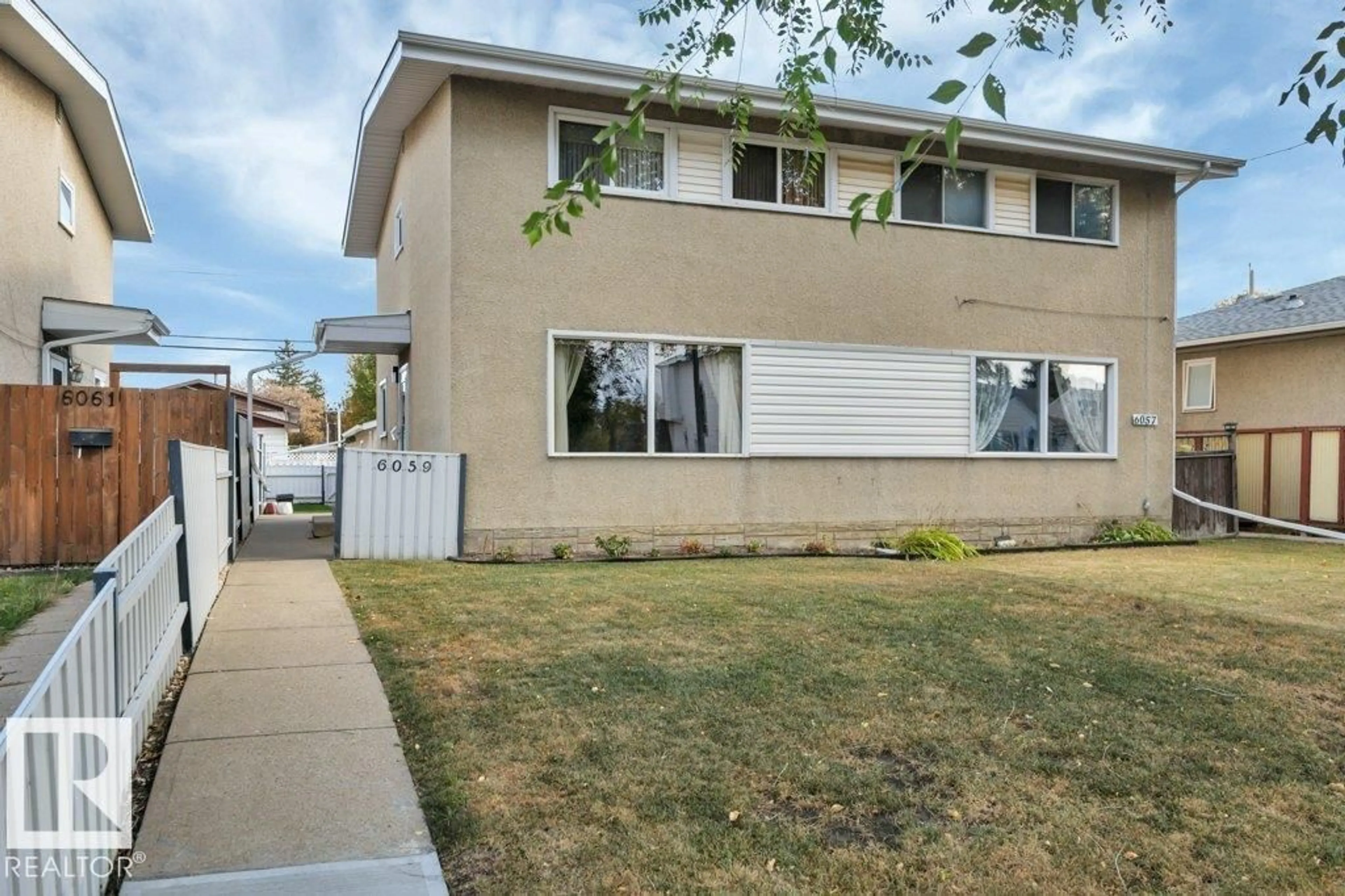 Home with vinyl exterior material, street for 6059 106 ST, Edmonton Alberta T6H2T5