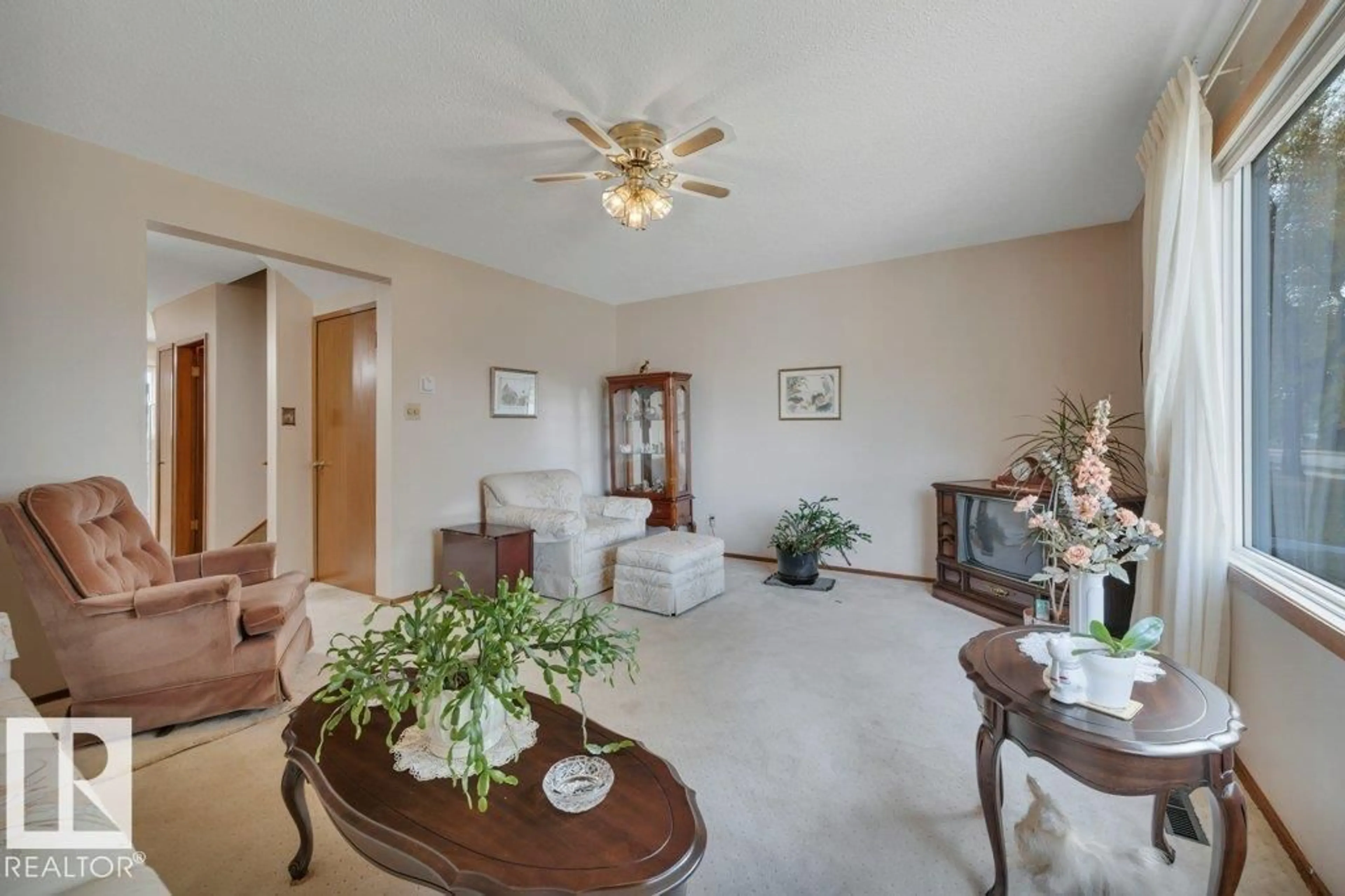 Living room with furniture, unknown for 6059 106 ST, Edmonton Alberta T6H2T5