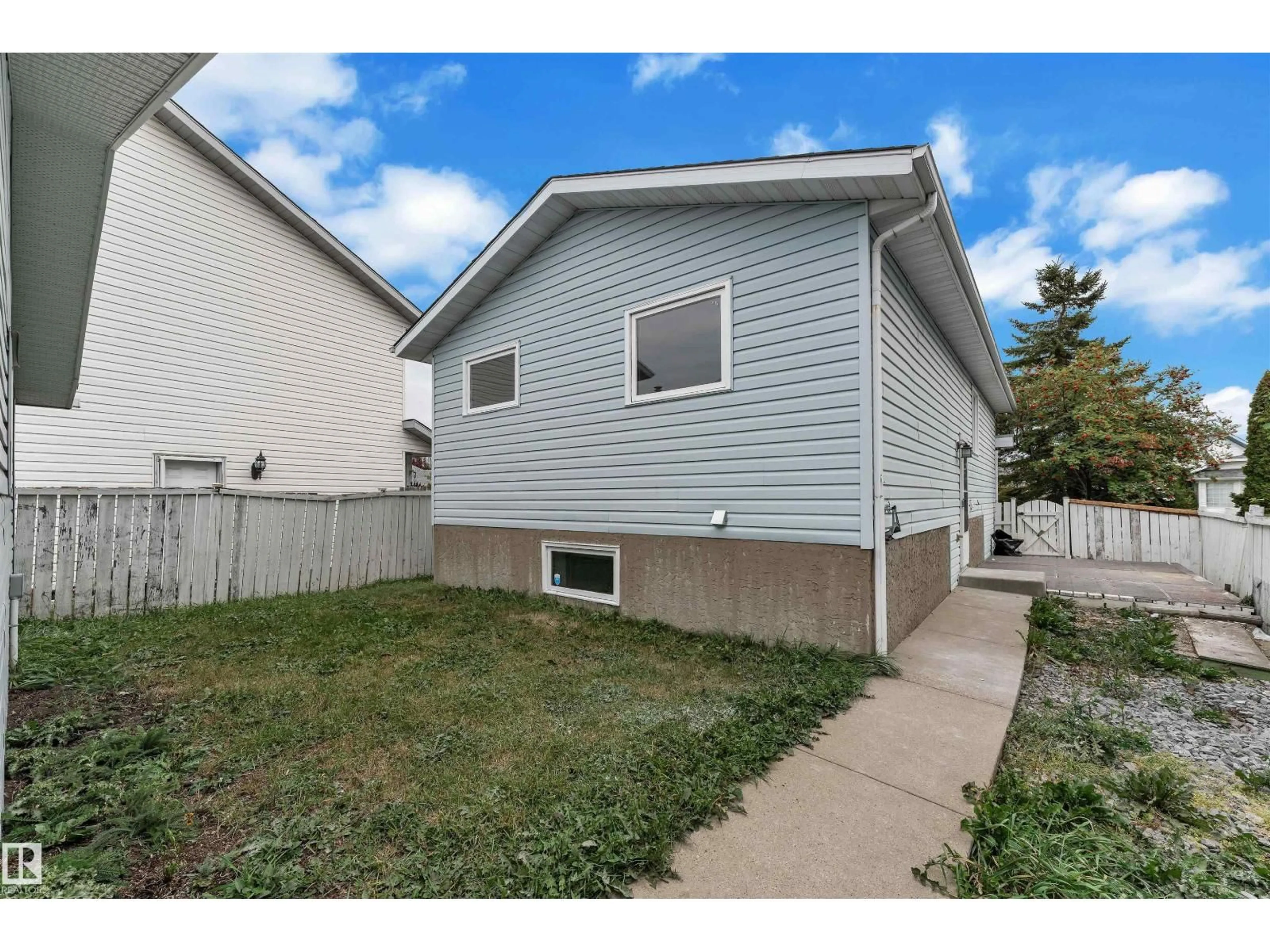 Home with vinyl exterior material, street for 756 JOHNS RD, Edmonton Alberta T6L6P2