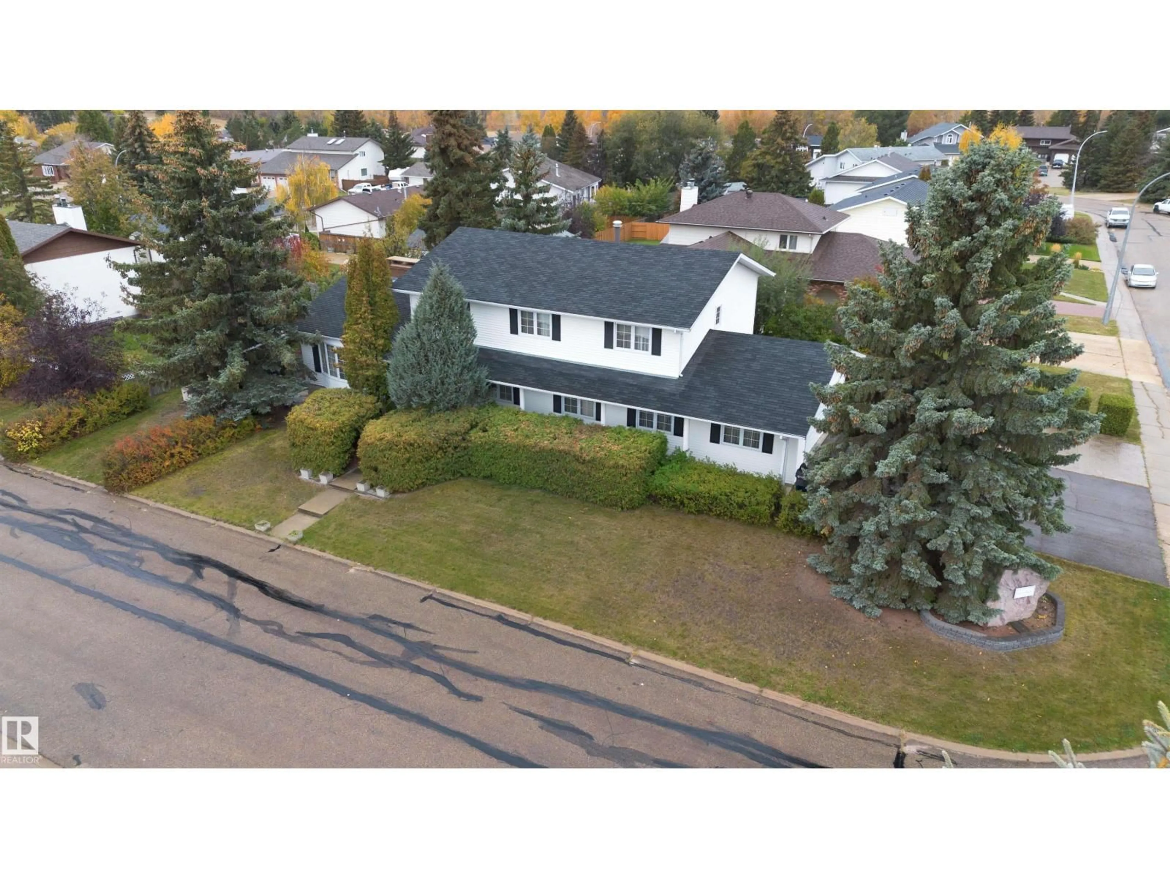A pic from outside/outdoor area/front of a property/back of a property/a pic from drone, street for 5519 60 AVE, Barrhead Alberta T7N1C8