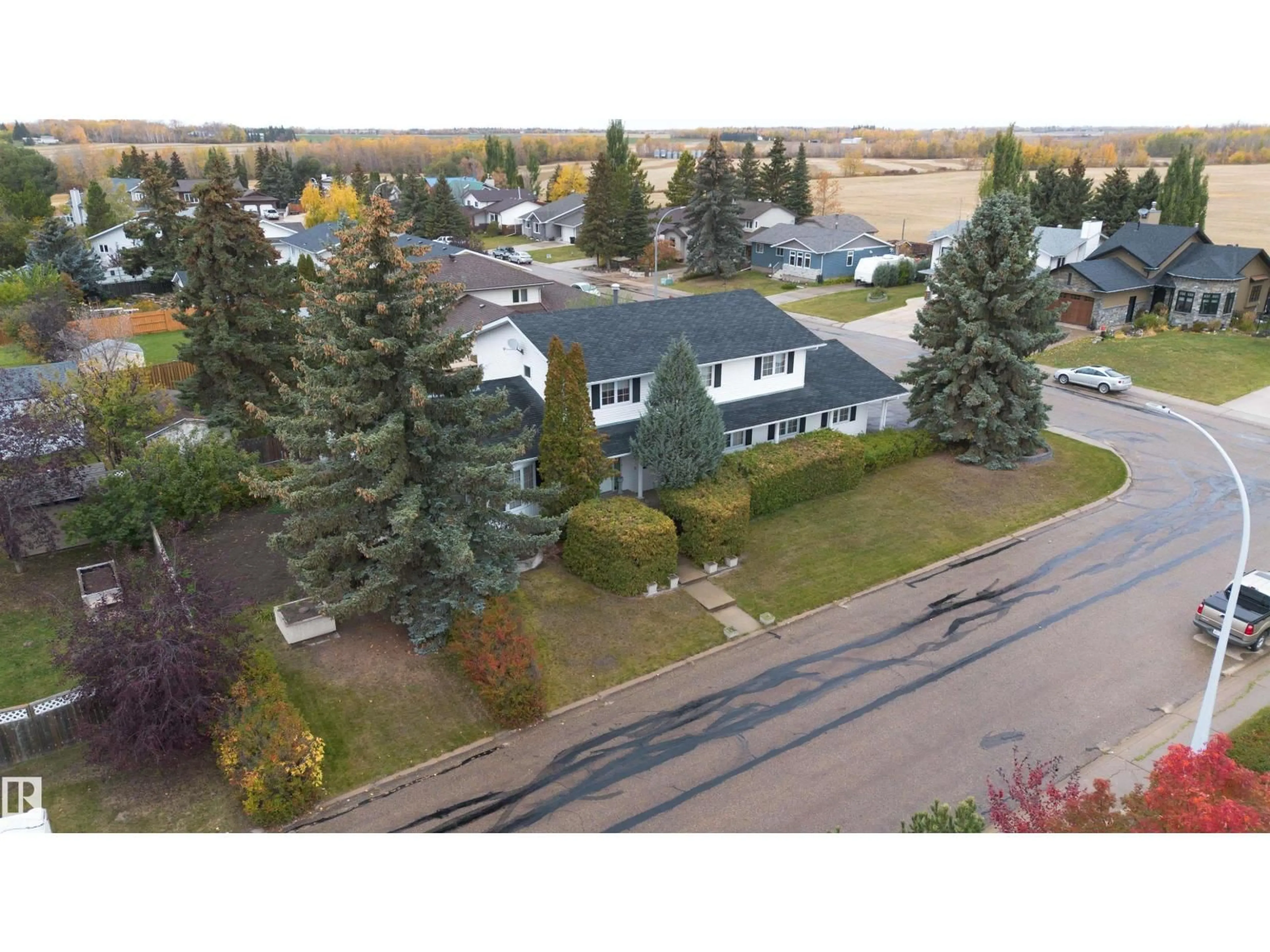 A pic from outside/outdoor area/front of a property/back of a property/a pic from drone, street for 5519 60 AVE, Barrhead Alberta T7N1C8