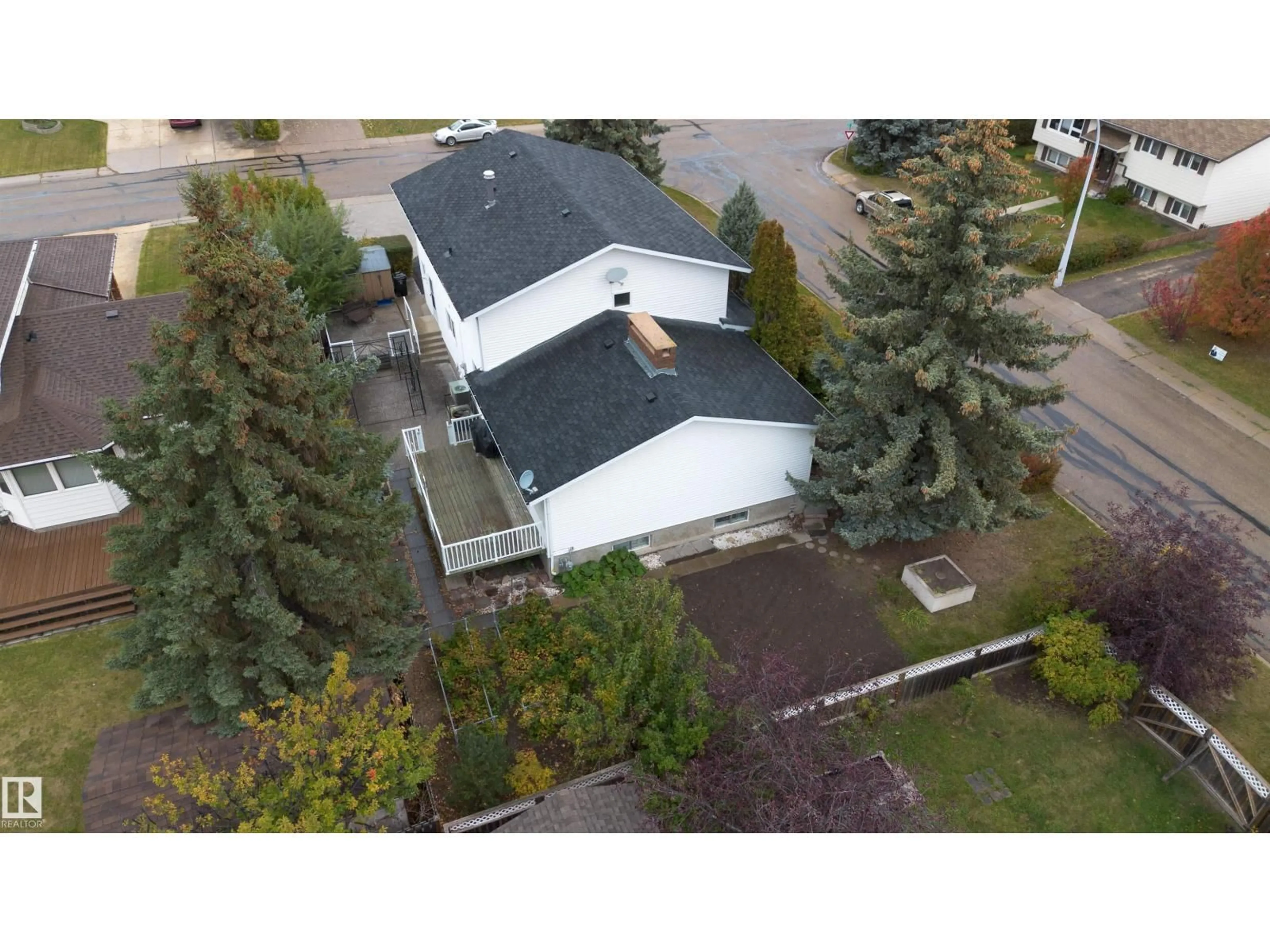 A pic from outside/outdoor area/front of a property/back of a property/a pic from drone, street for 5519 60 AVE, Barrhead Alberta T7N1C8