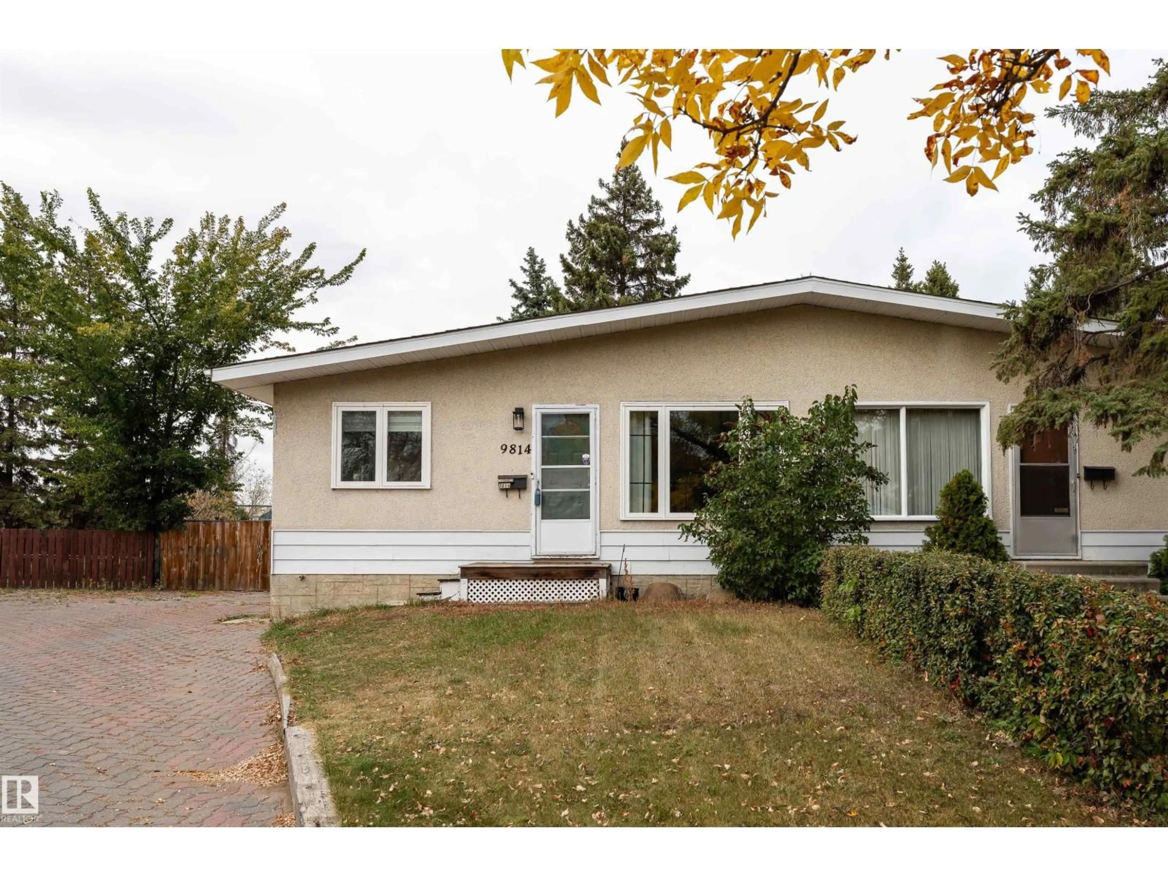 Home with vinyl exterior material, street for 9814 91 ST, Fort Saskatchewan Alberta T8L1L3