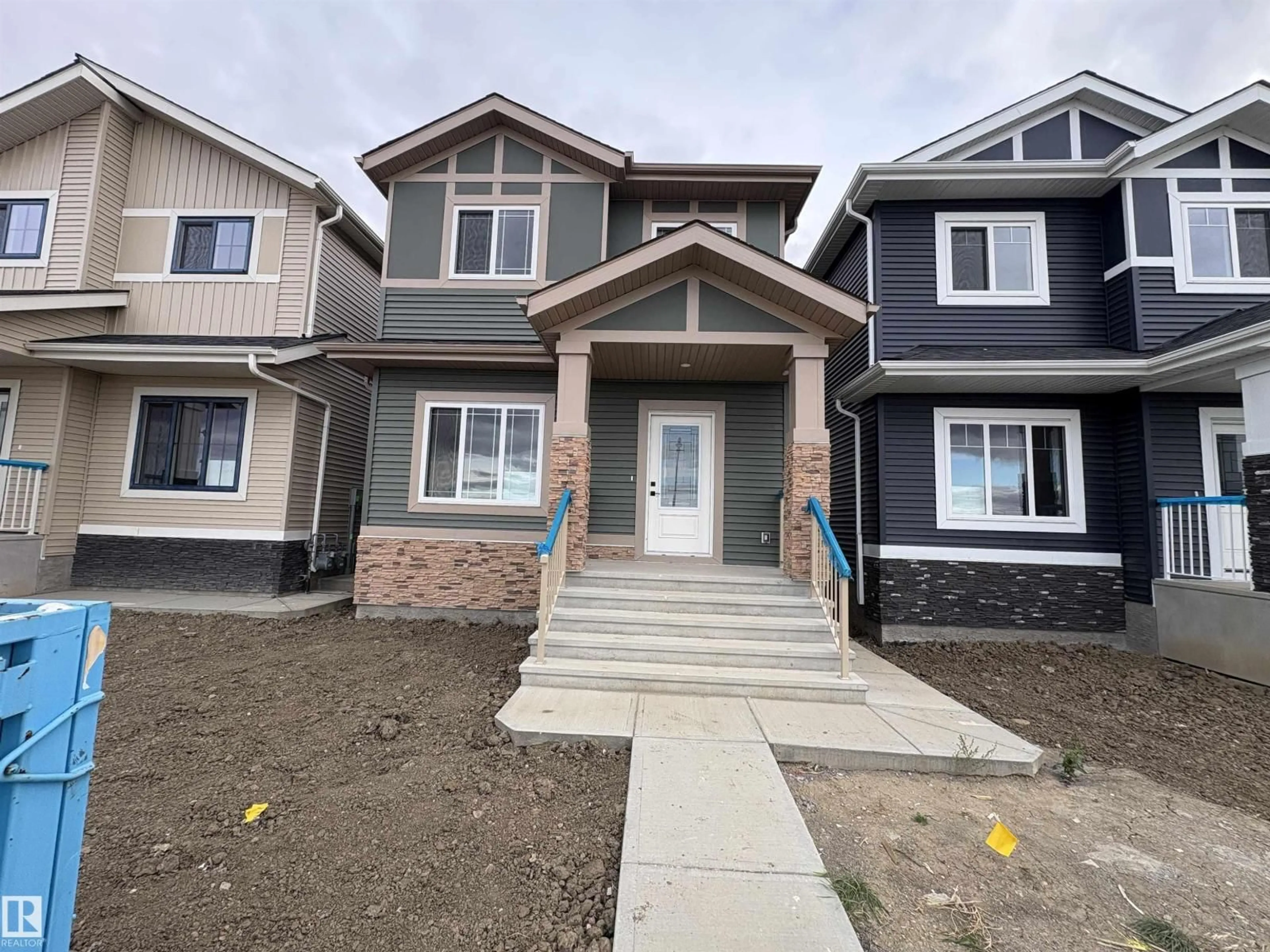 Home with vinyl exterior material, street for 9829 107A AV, Morinville Alberta T8R2P2