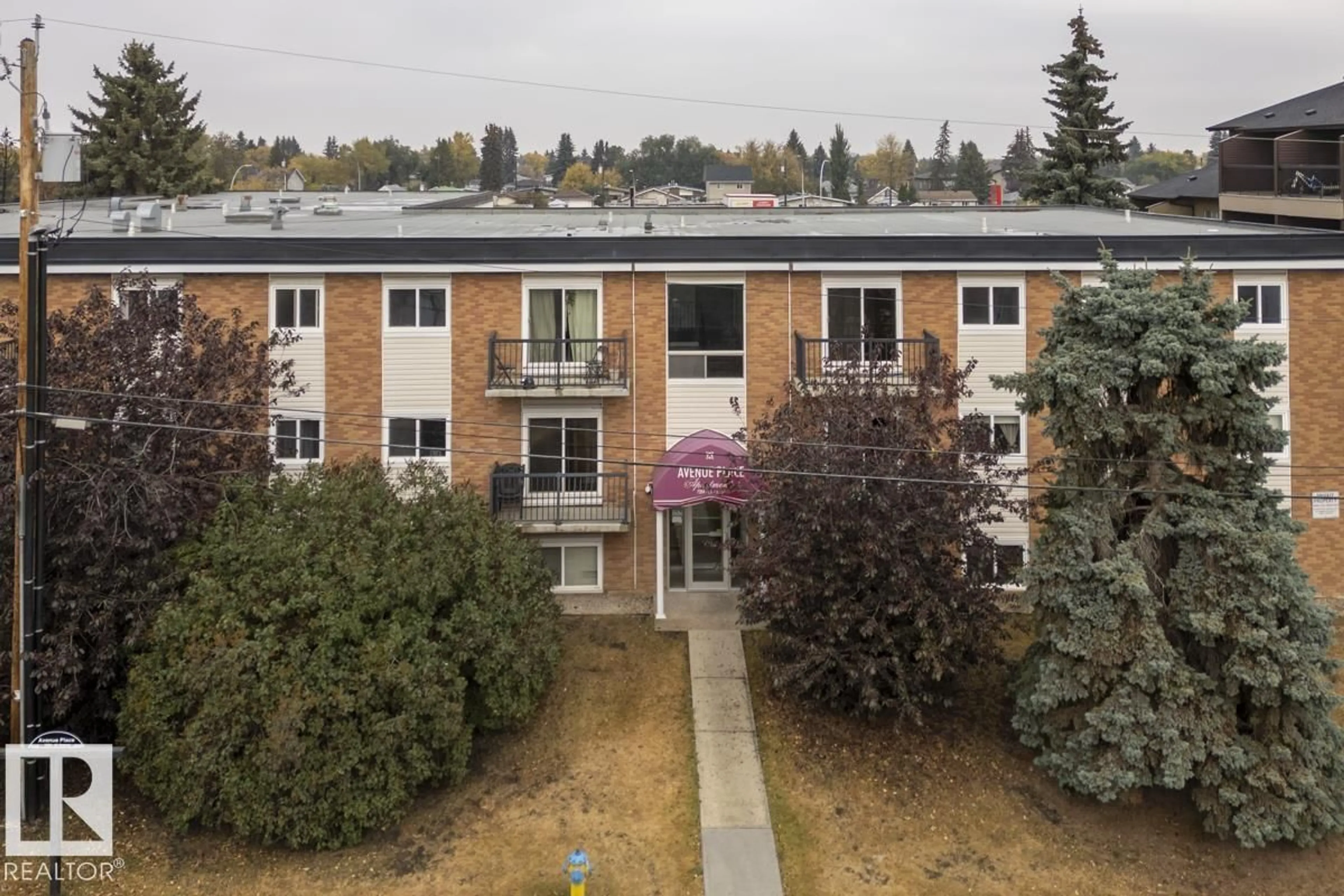 A pic from outside/outdoor area/front of a property/back of a property/a pic from drone, building for 301 - 7204 81 AV NW, Edmonton Alberta T6B0E2