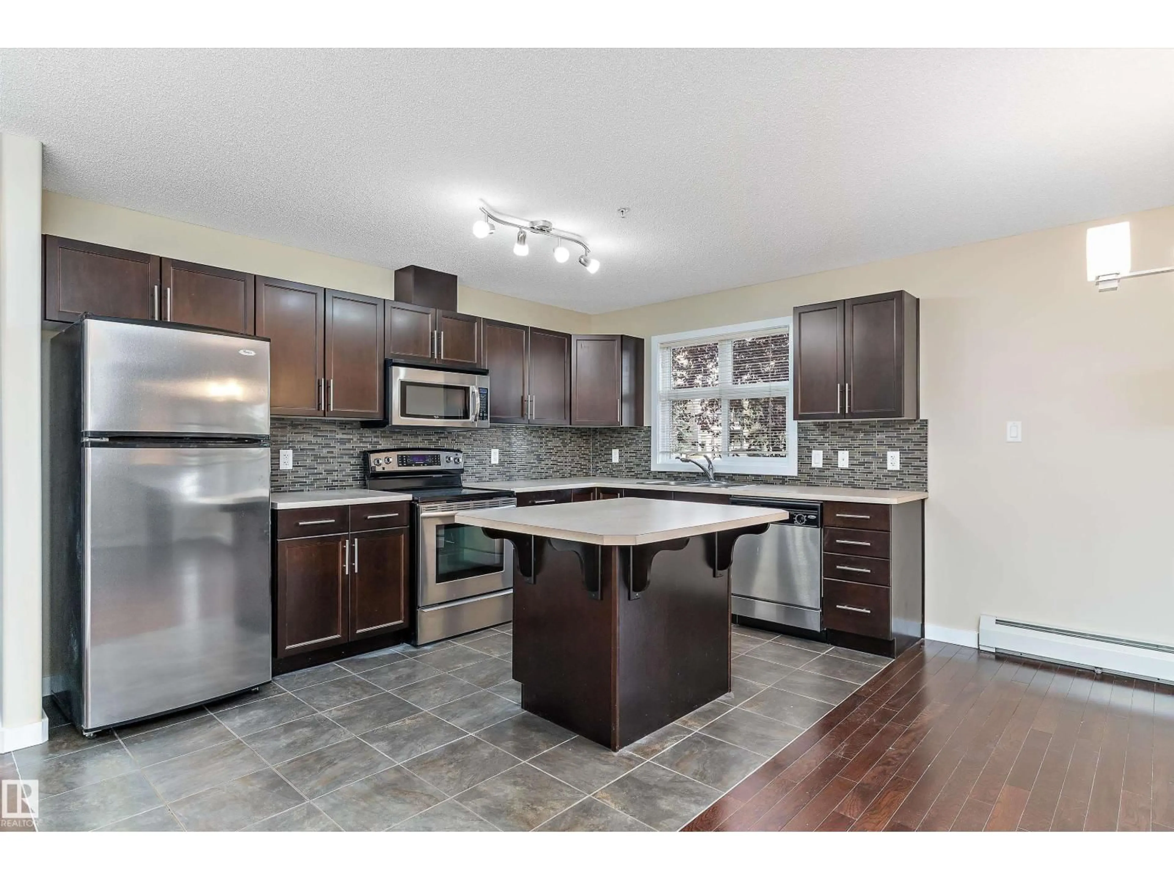 Open concept kitchen, unknown for #132 - 11603 ELLERSLIE RD, Edmonton Alberta T6W0J3