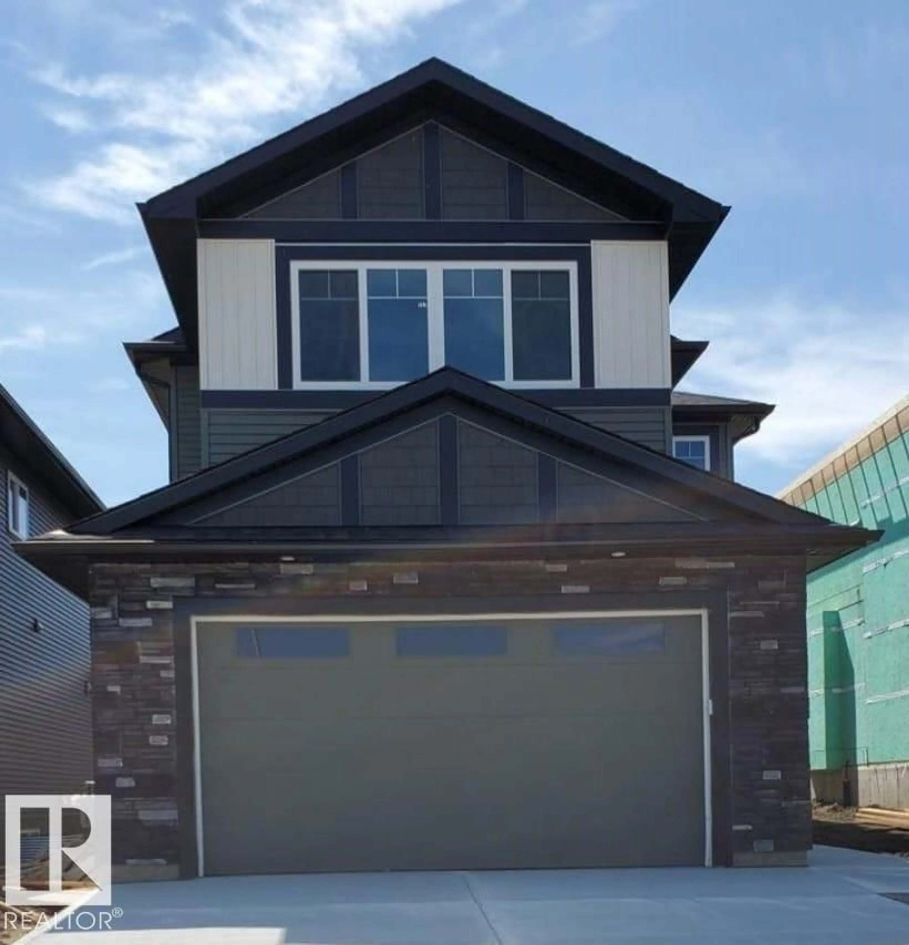 Home with vinyl exterior material, street for 9615 89A ST, Morinville Alberta T8R2R6