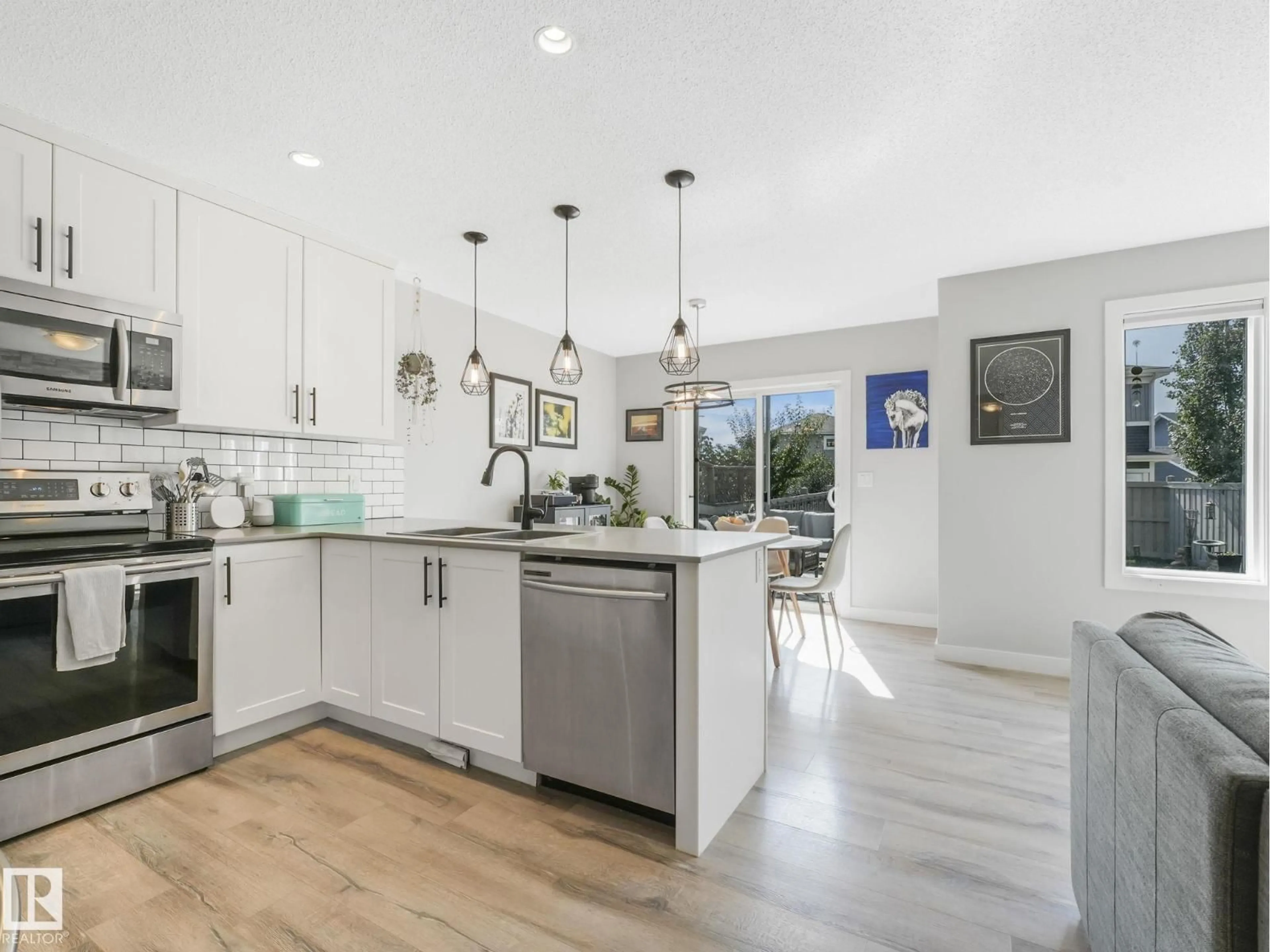 Open concept kitchen, ceramic/tile floor for NW - 22119 87 AV, Edmonton Alberta T5T7H7