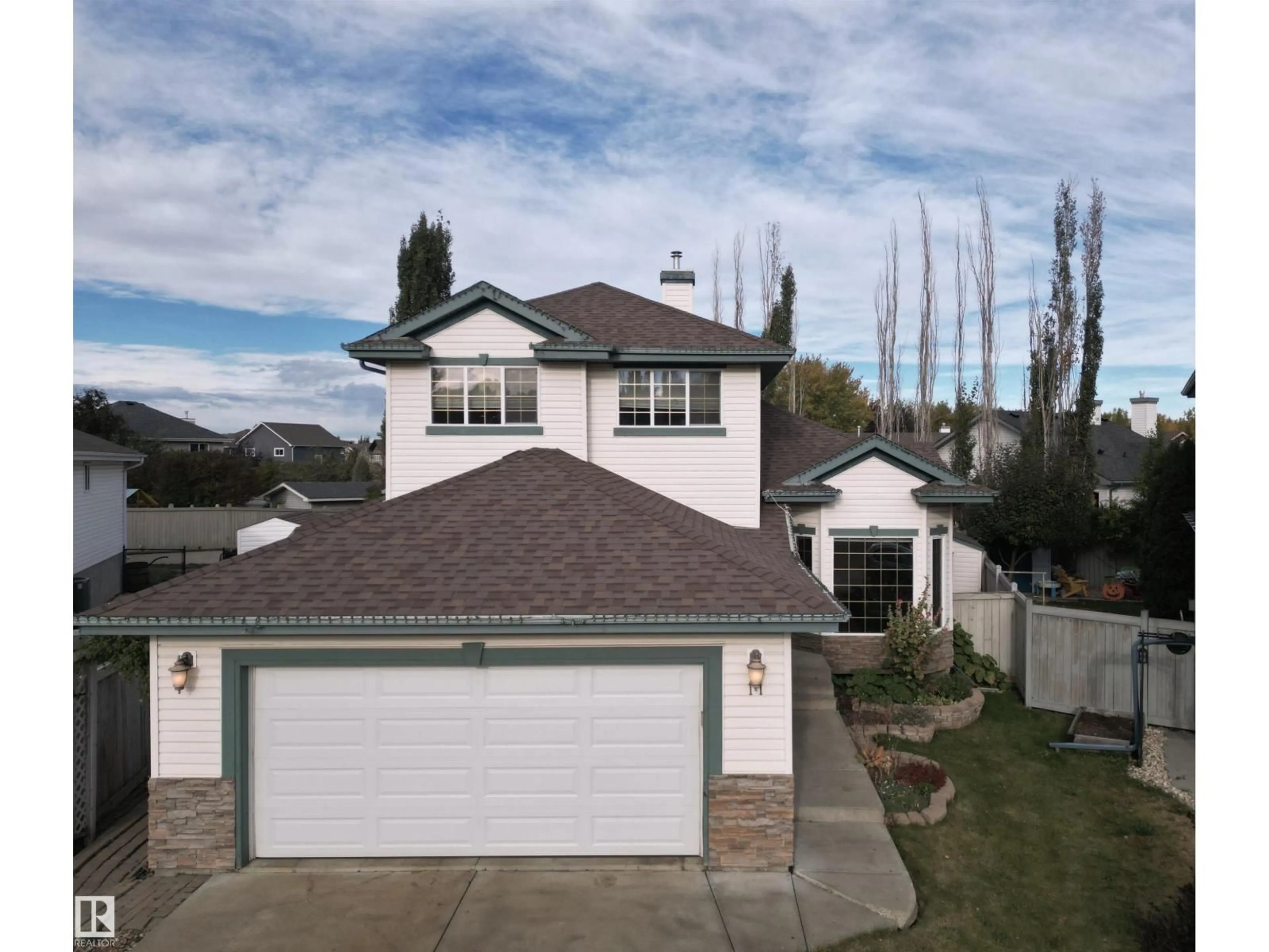 A pic from outside/outdoor area/front of a property/back of a property/a pic from drone, mountain view for 11 ESCADA CL, St. Albert Alberta T8N6X5