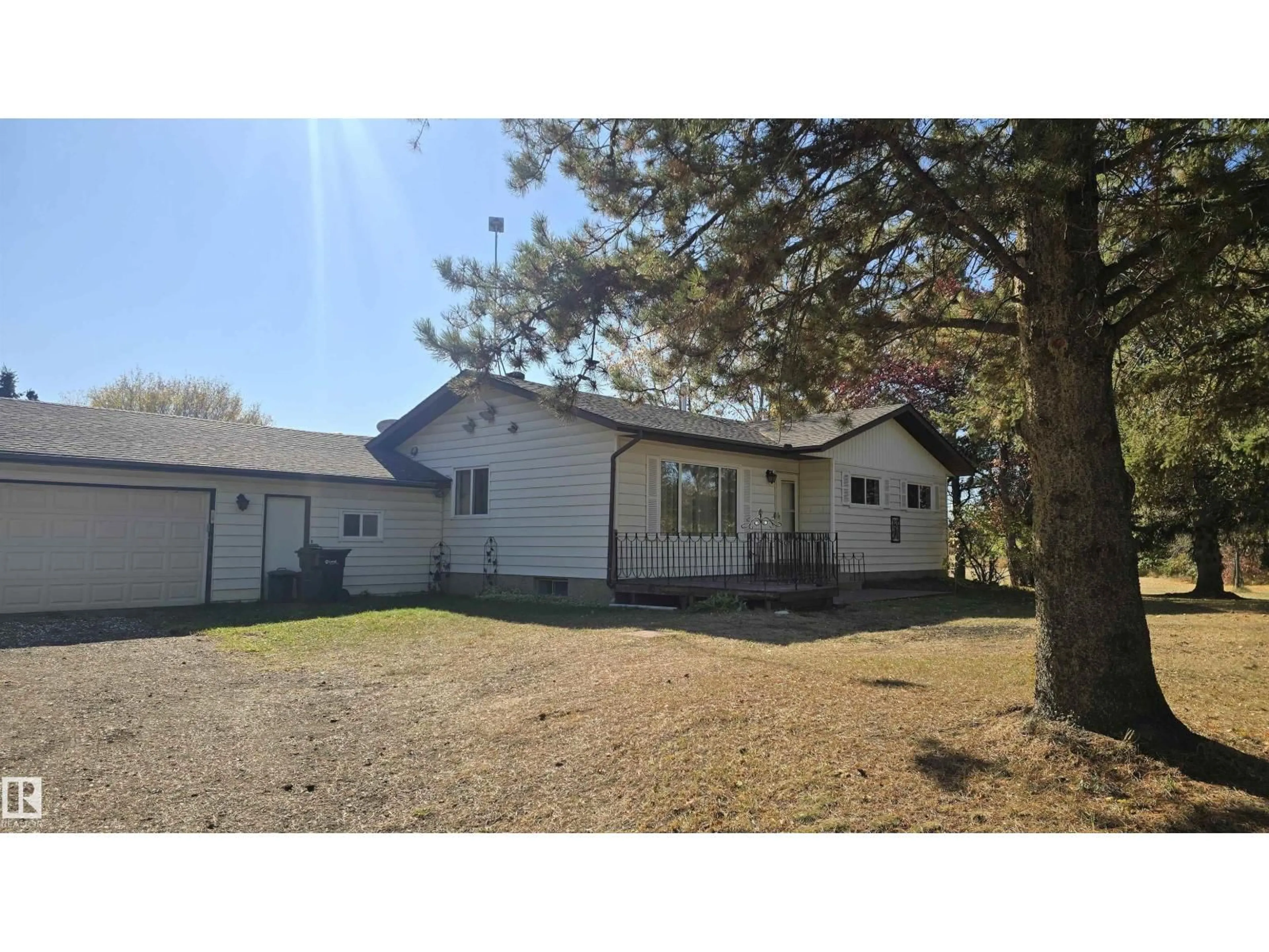 A pic from outside/outdoor area/front of a property/back of a property/a pic from drone, unknown for 30 53111 RGE ROAD 22, Rural Parkland County Alberta T7Y2J4