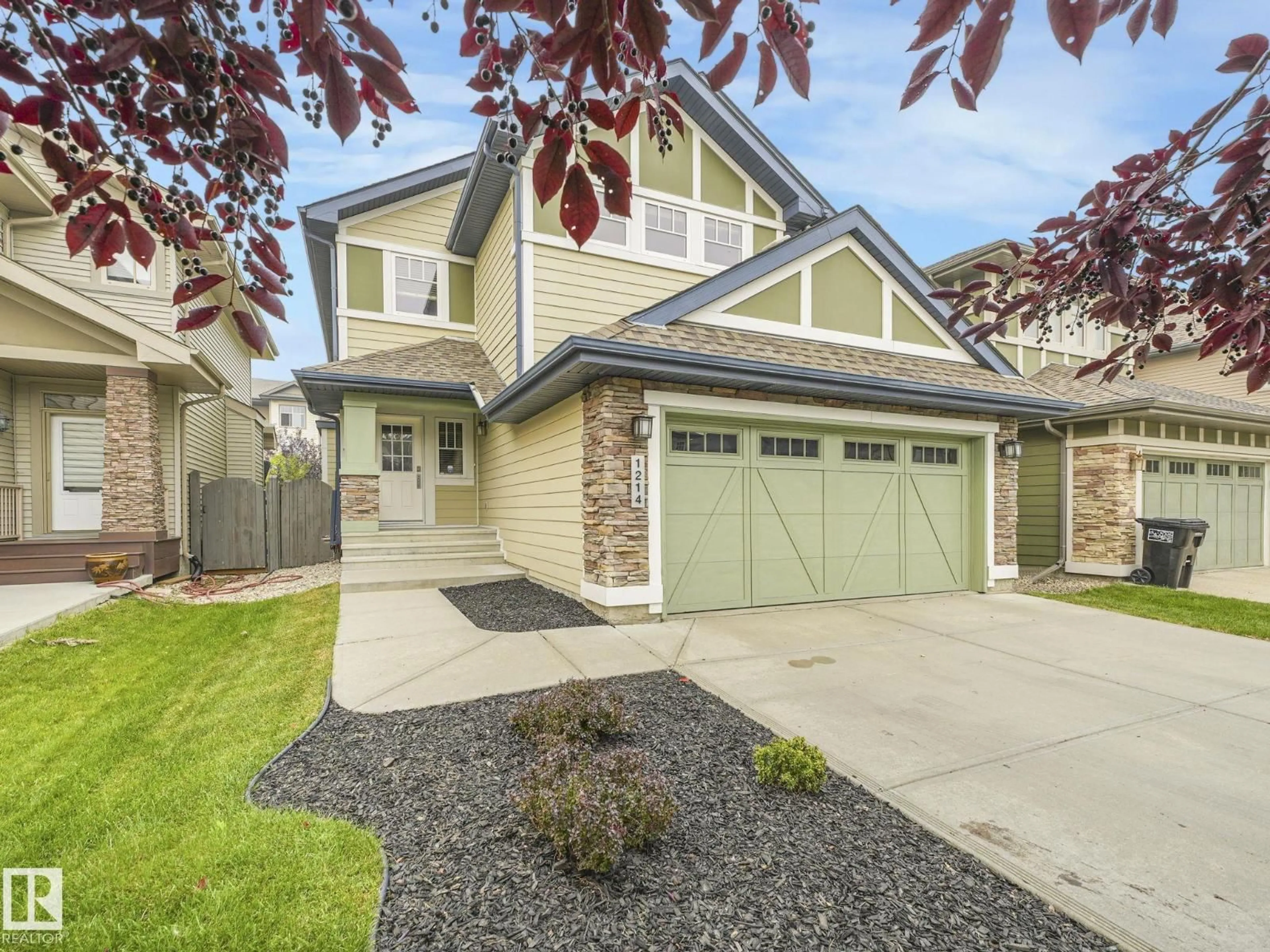 Home with vinyl exterior material, street for 1214 AINSLIE WY, Edmonton Alberta T6W0H7