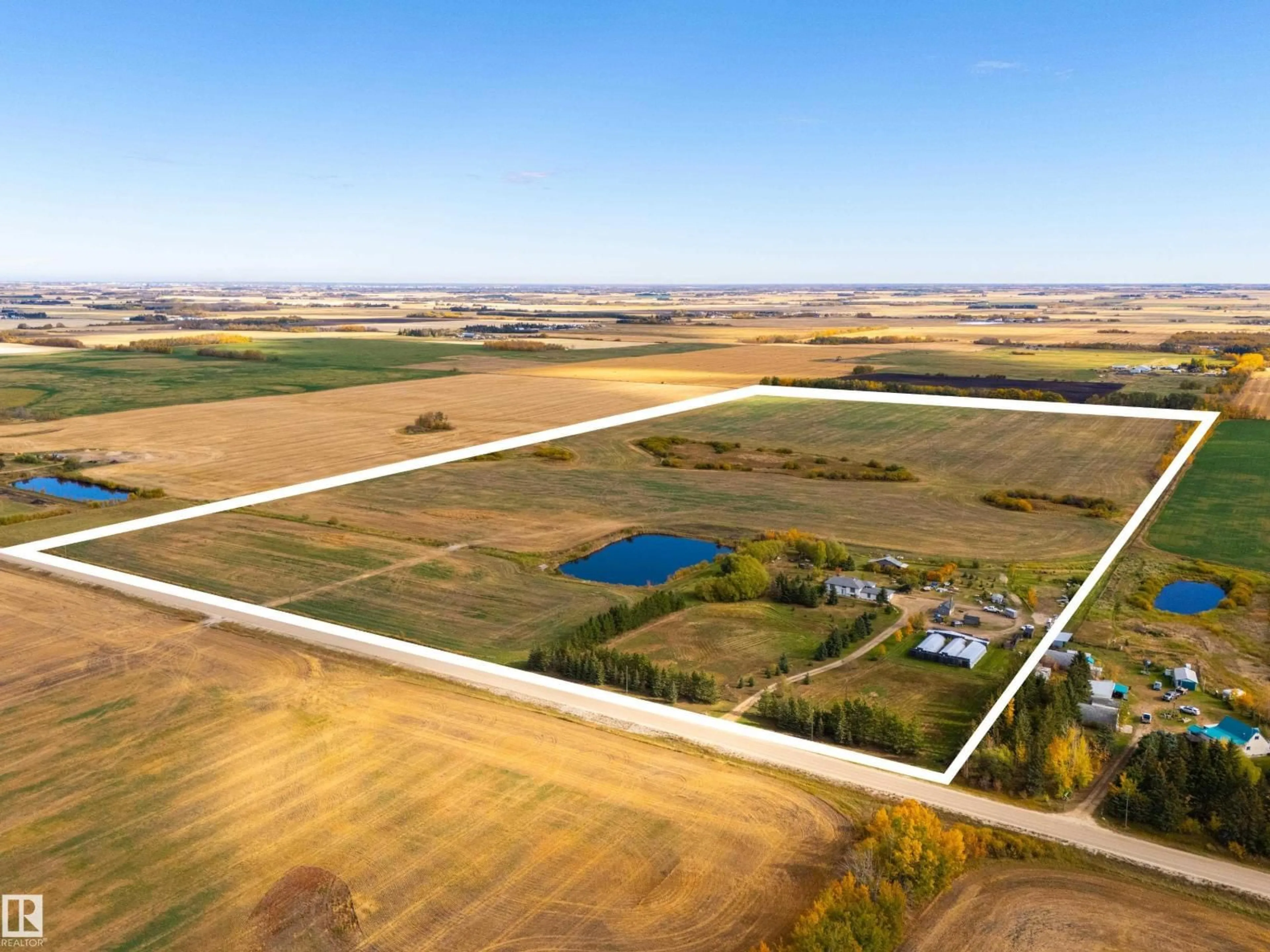 A pic from outside/outdoor area/front of a property/back of a property/a pic from drone, water/lake/river/ocean view for 48503 RANGE ROAD 263, Rural Leduc County Alberta T0C0V0