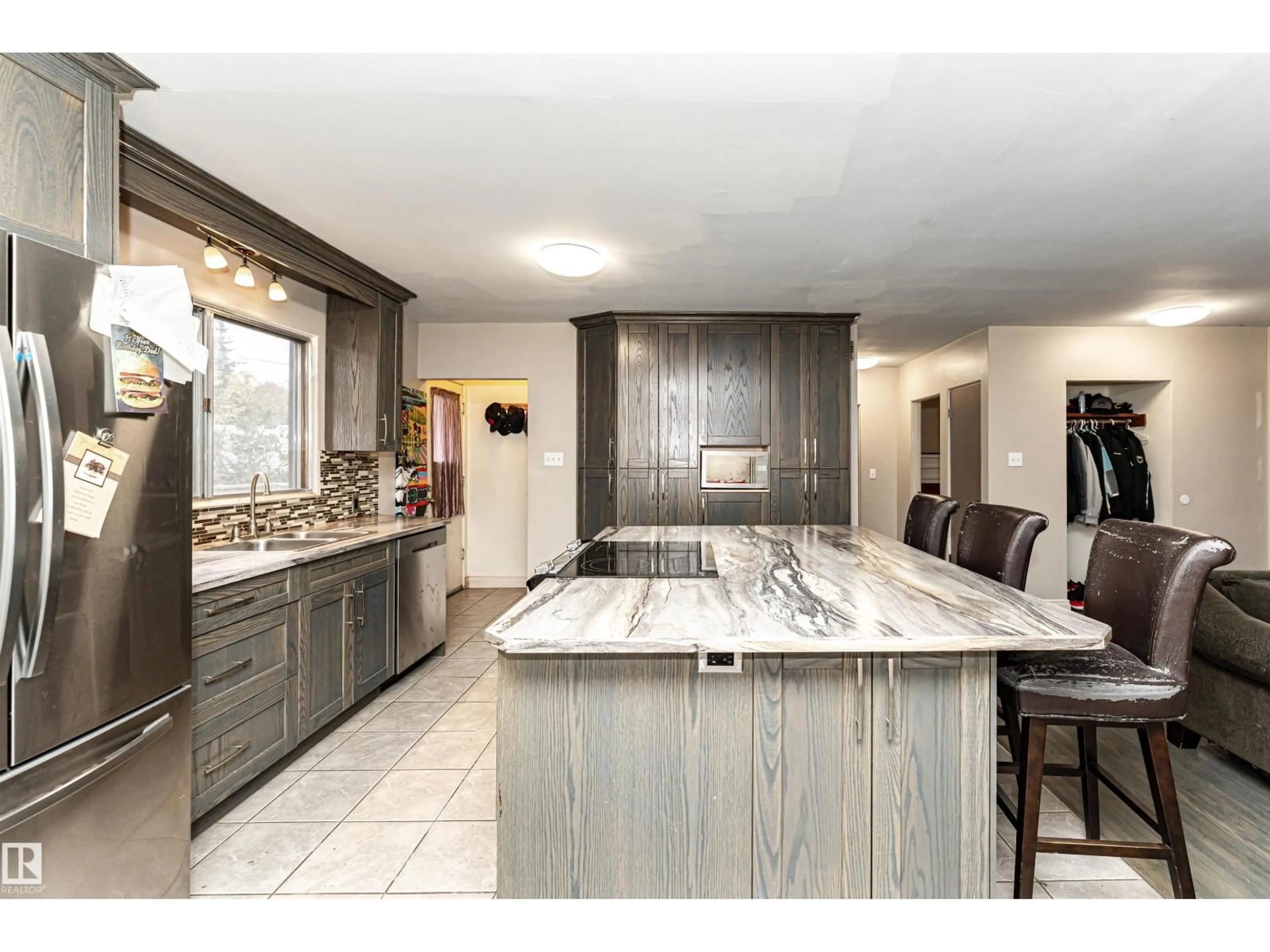 Open concept kitchen, ceramic/tile floor for 10619 149 ST, Edmonton Alberta T5P1L9