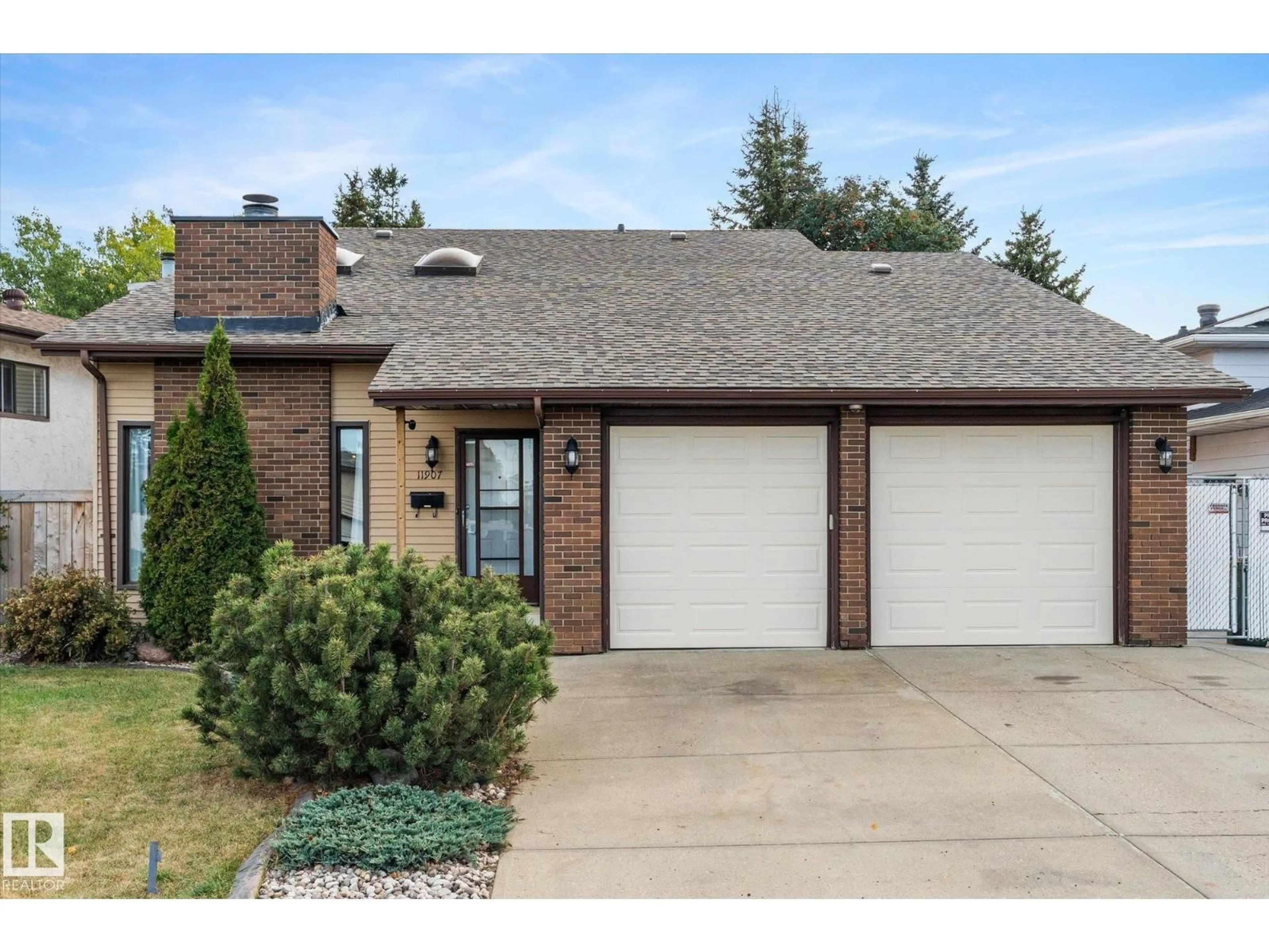 Home with brick exterior material, street for 11907 164 AV, Edmonton Alberta T5X5C1