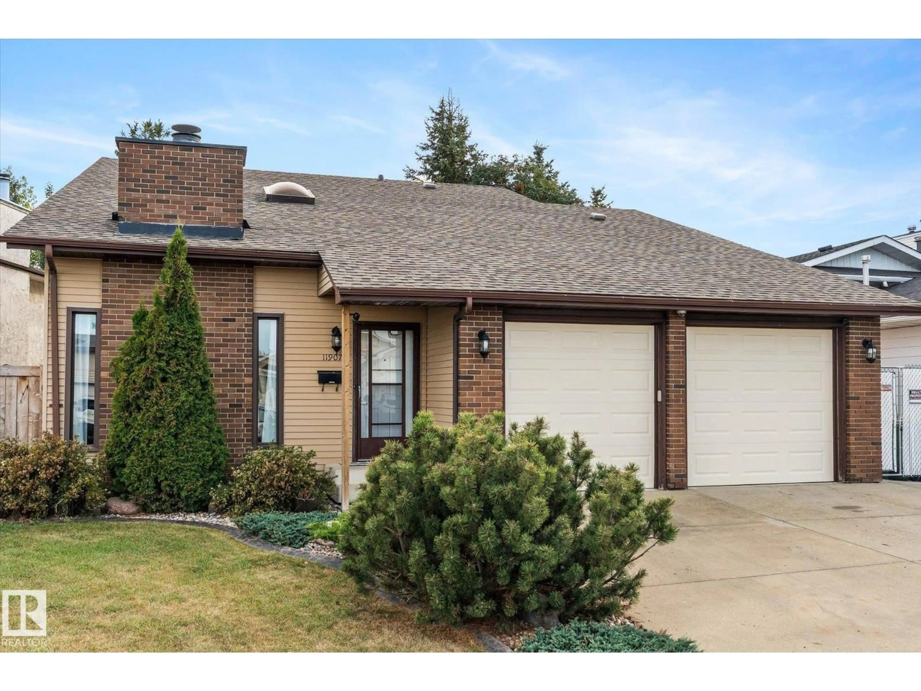 Home with brick exterior material, street for 11907 164 AV, Edmonton Alberta T5X5C1