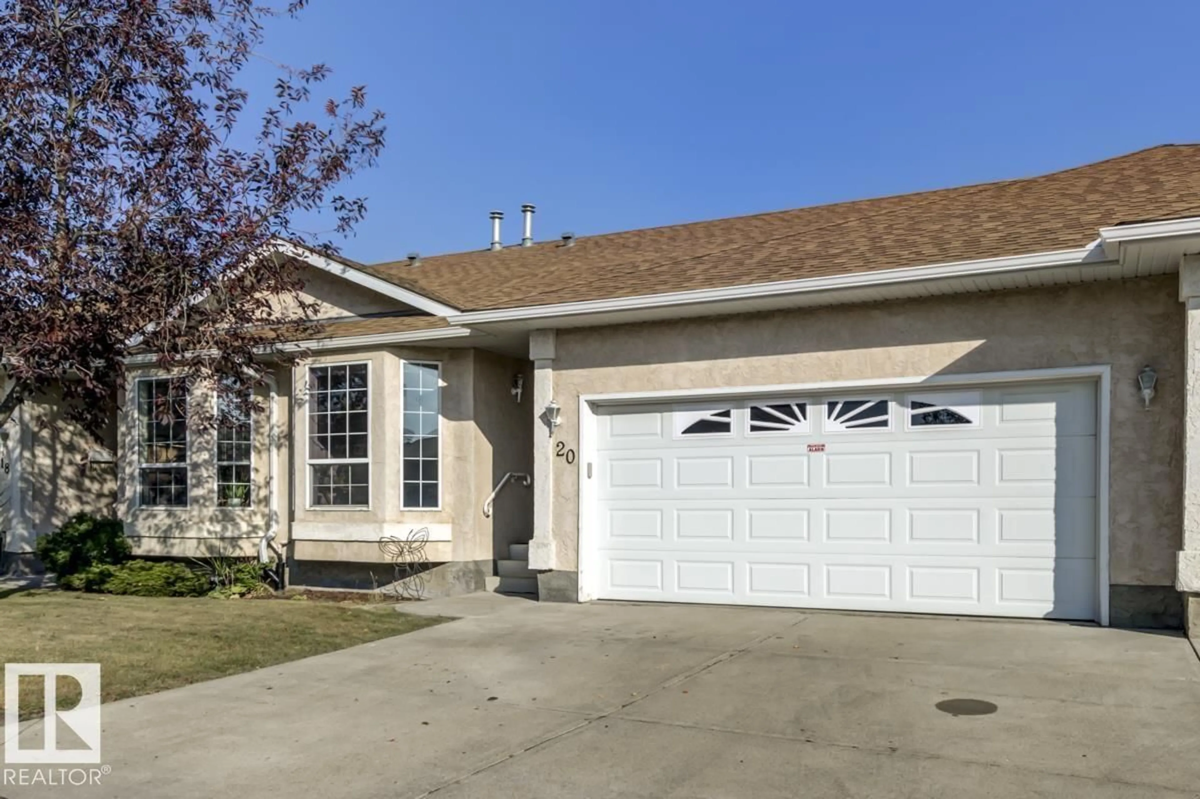 Home with vinyl exterior material, street for 13320 - 20 124 ST, Edmonton Alberta T5L3B7