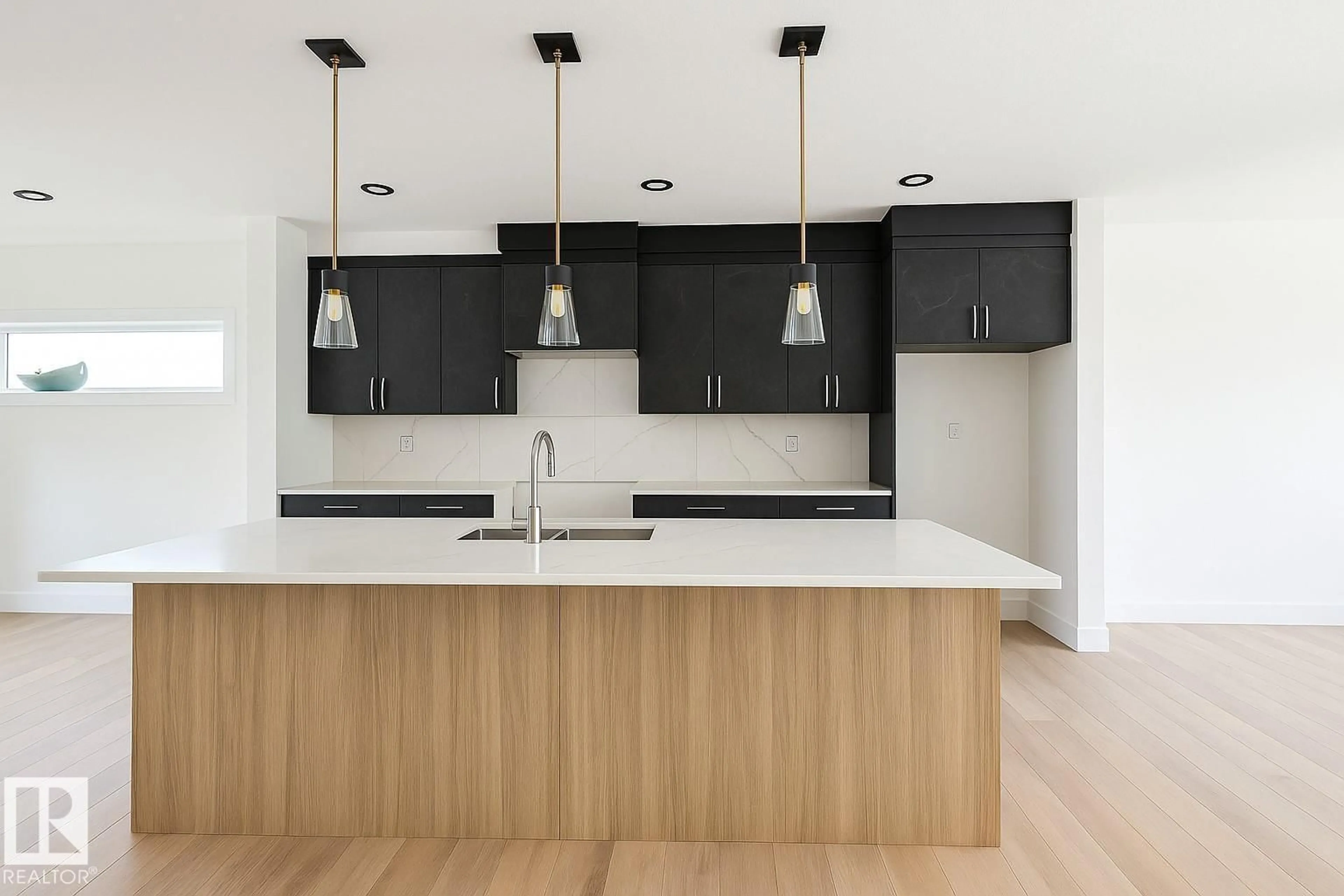 Open concept kitchen, wood/laminate floor for NW - 5304 104A ST, Edmonton Alberta T6H2M1