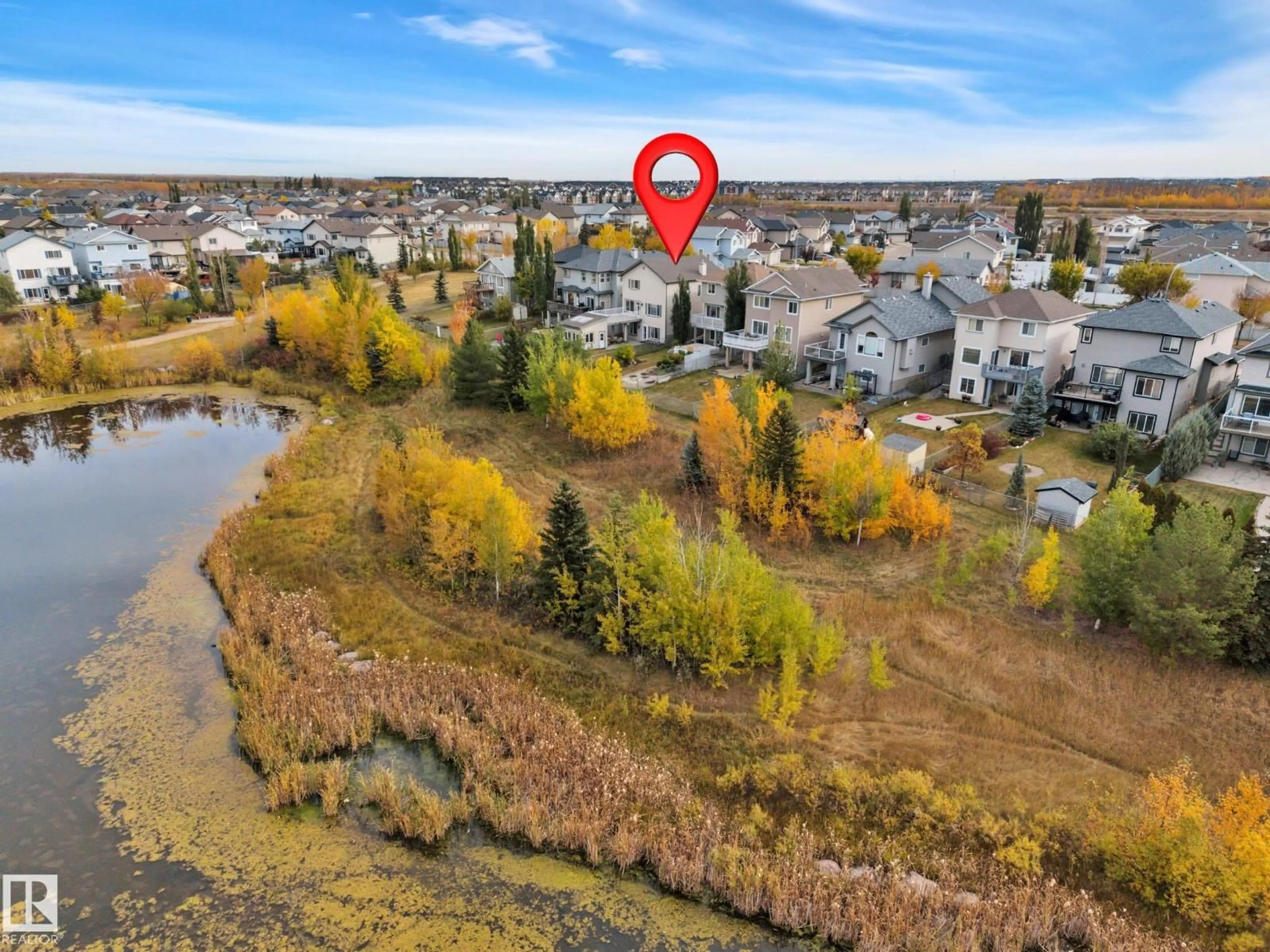 A pic from outside/outdoor area/front of a property/back of a property/a pic from drone, water/lake/river/ocean view for 17632 87 ST, Edmonton Alberta T5Z0A4