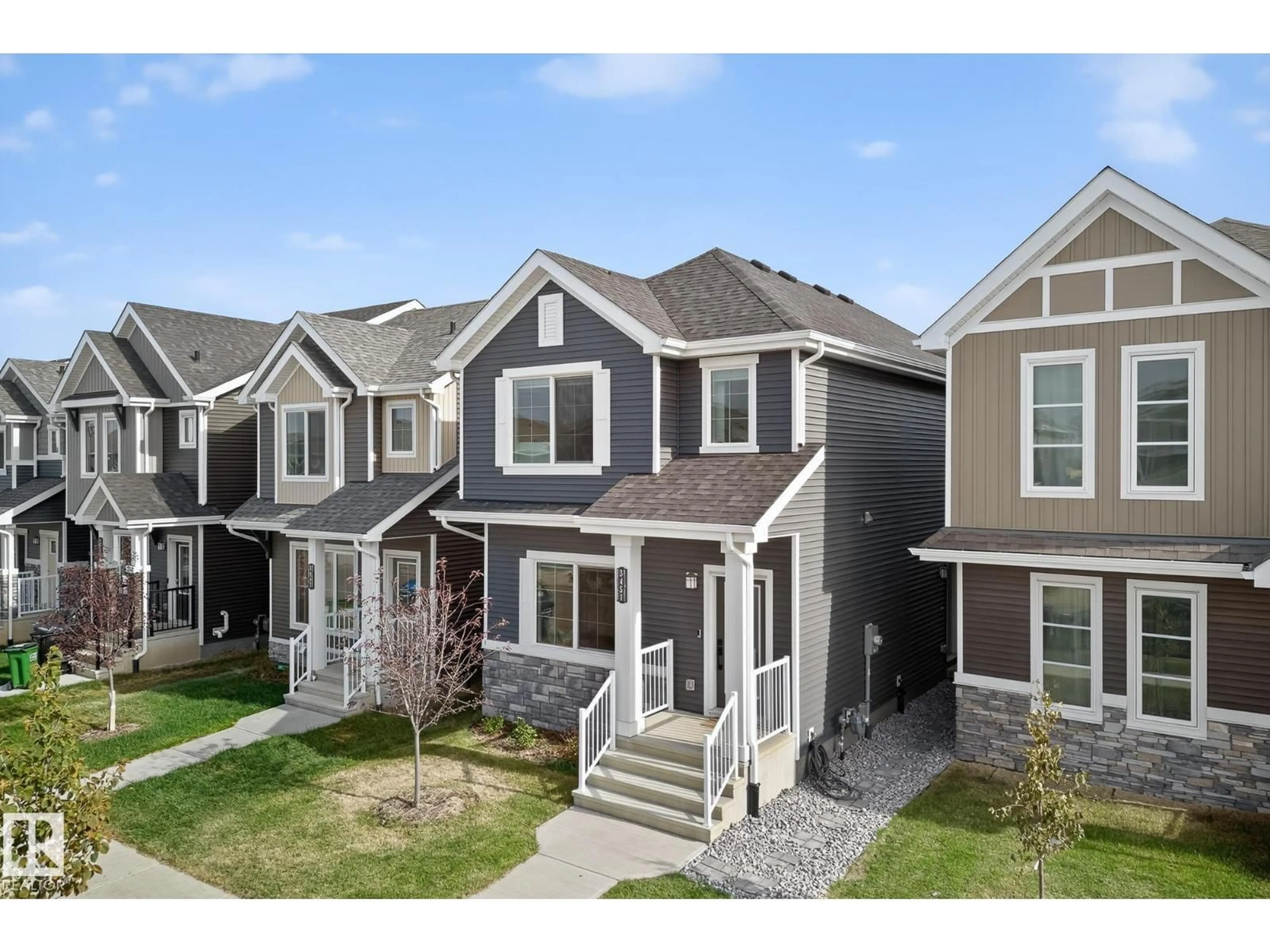 Home with vinyl exterior material, street for SW - 3451 169 ST, Edmonton Alberta T6W5M4