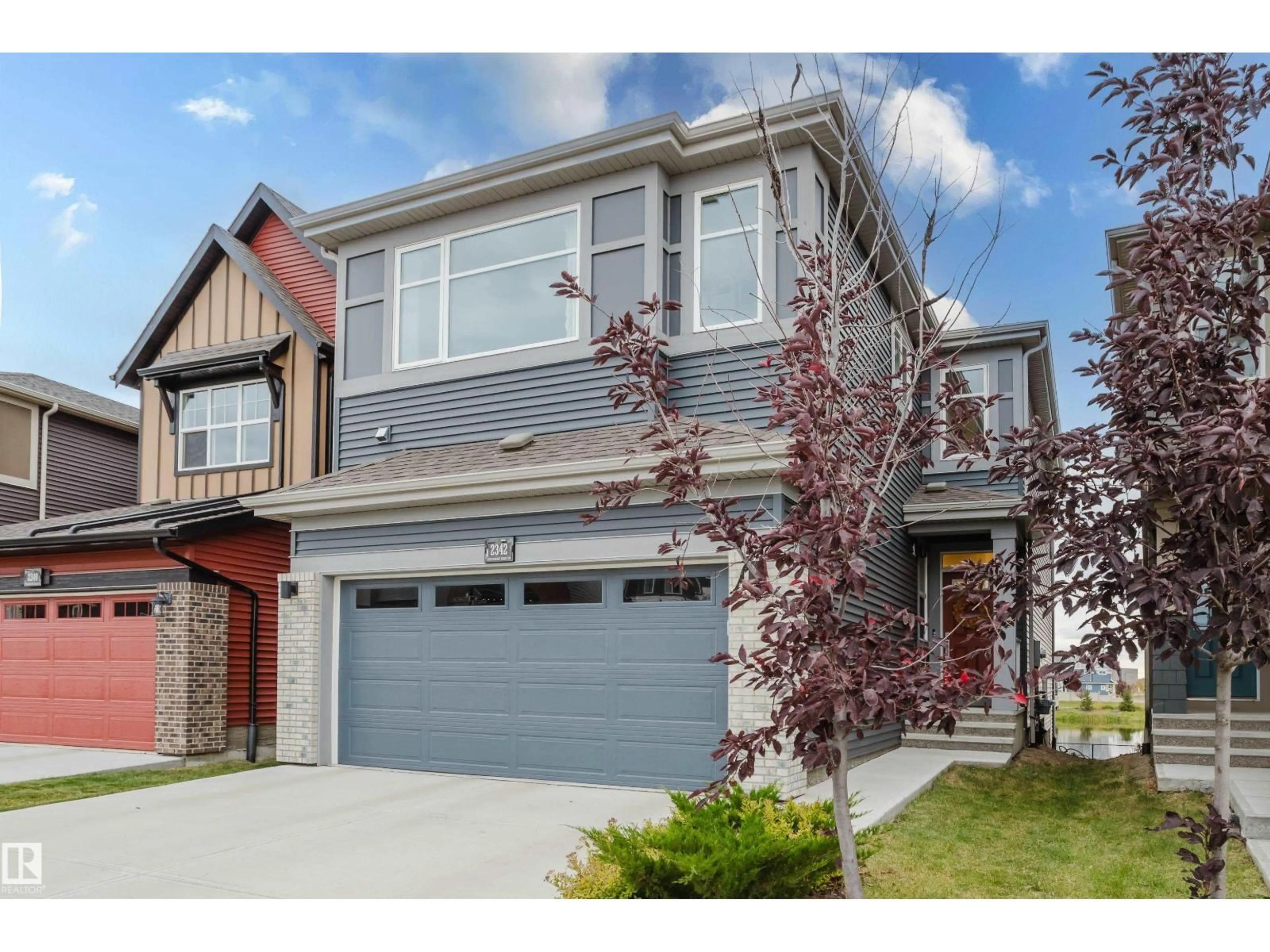 Home with vinyl exterior material, street for 2342 CHOKECHERRY CL, Edmonton Alberta T6X2M8