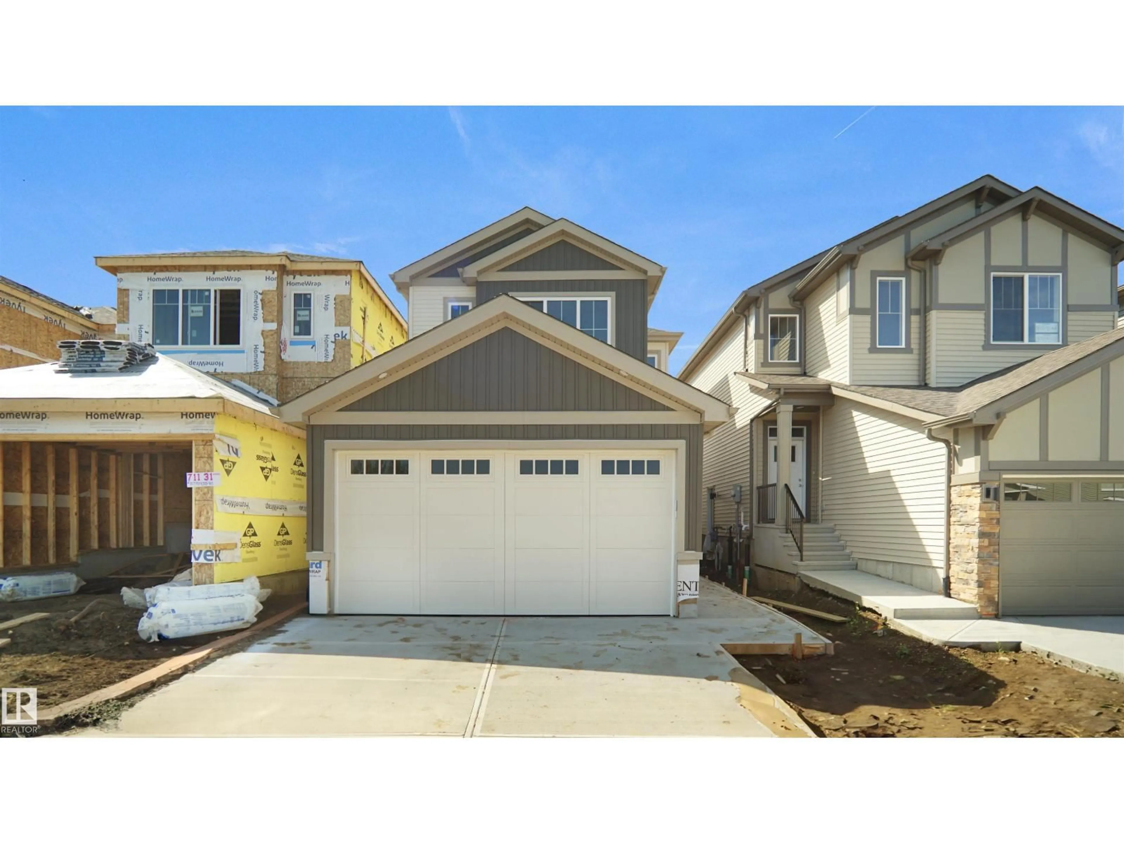 Home with vinyl exterior material, street for 711 31 AV, Edmonton Alberta T6T2V6