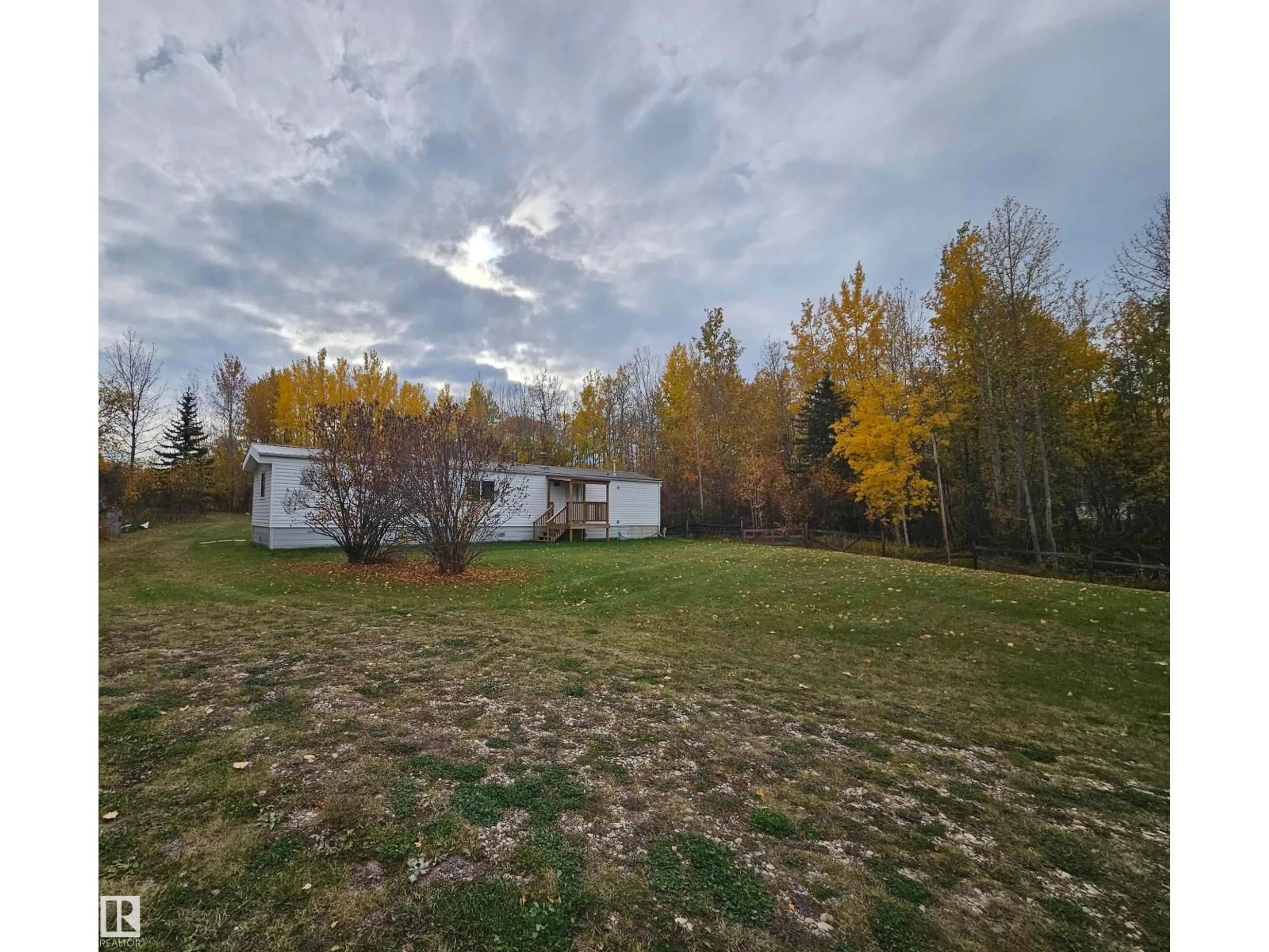 A pic from outside/outdoor area/front of a property/back of a property/a pic from drone, forest/trees view for #46 - 54222 RGE ROAD 25, Rural Lac Ste. Anne County Alberta T0E1V0
