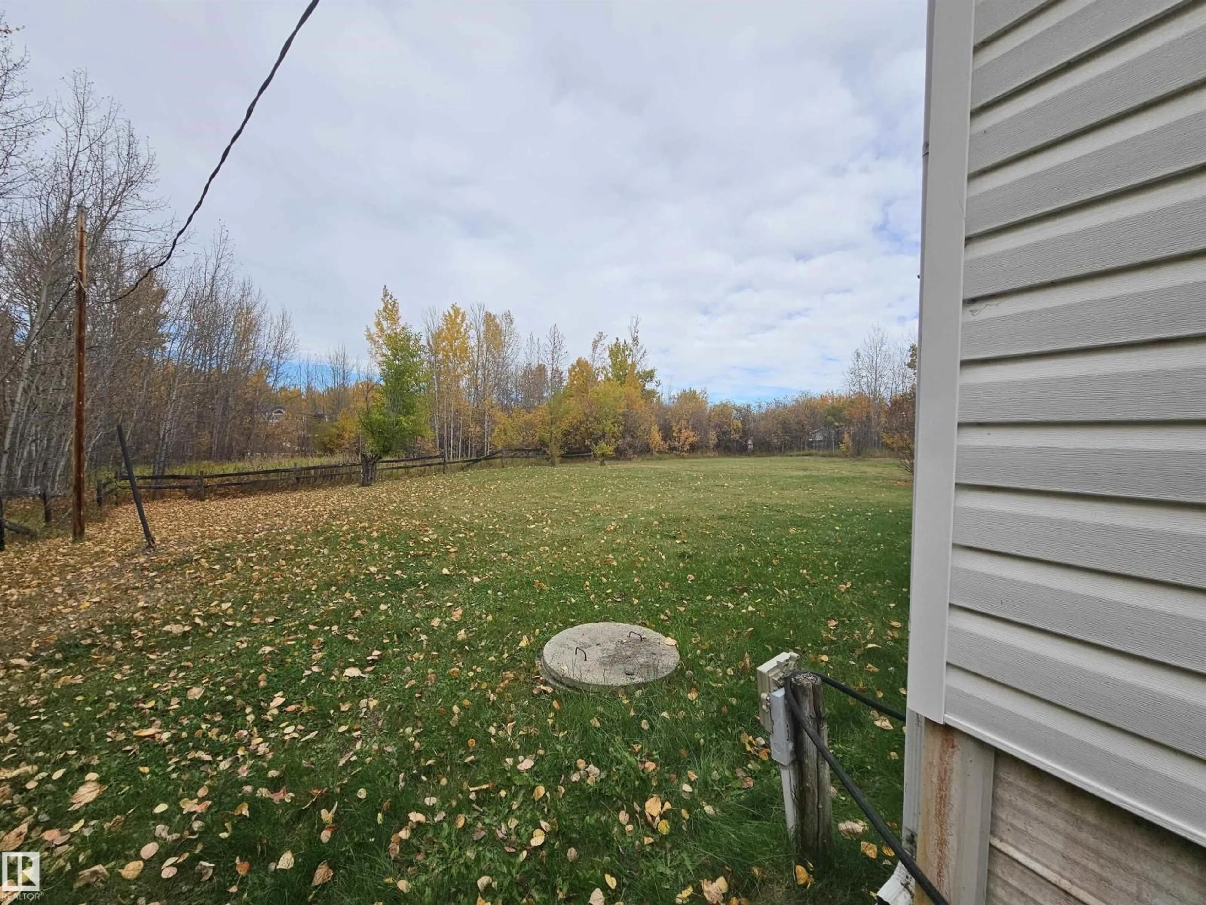 A pic from outside/outdoor area/front of a property/back of a property/a pic from drone, unknown for #46 - 54222 RGE ROAD 25, Rural Lac Ste. Anne County Alberta T0E1V0