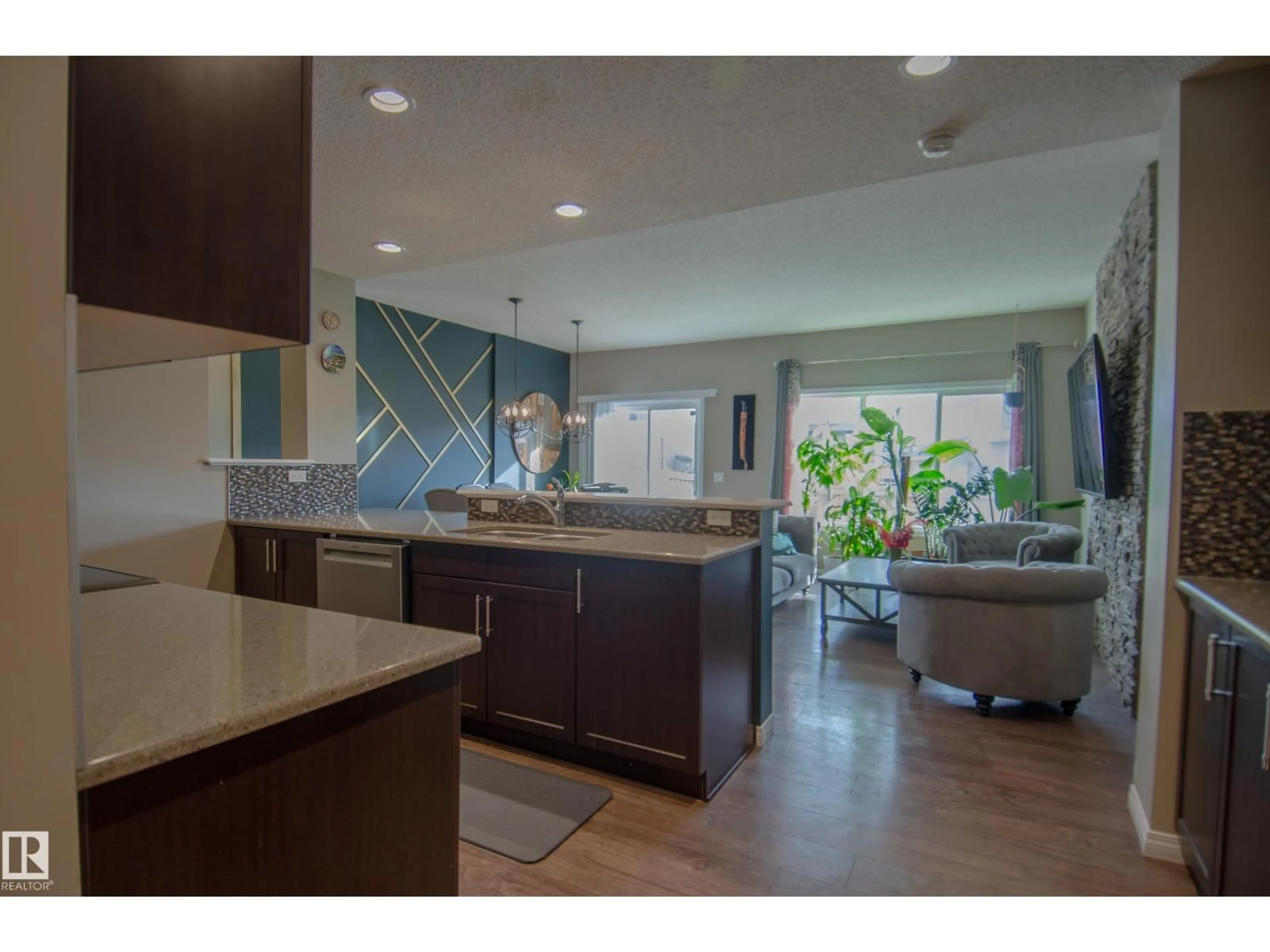 Open concept kitchen, ceramic/tile floor for 6129 176 AV, Edmonton Alberta T5Y3P1