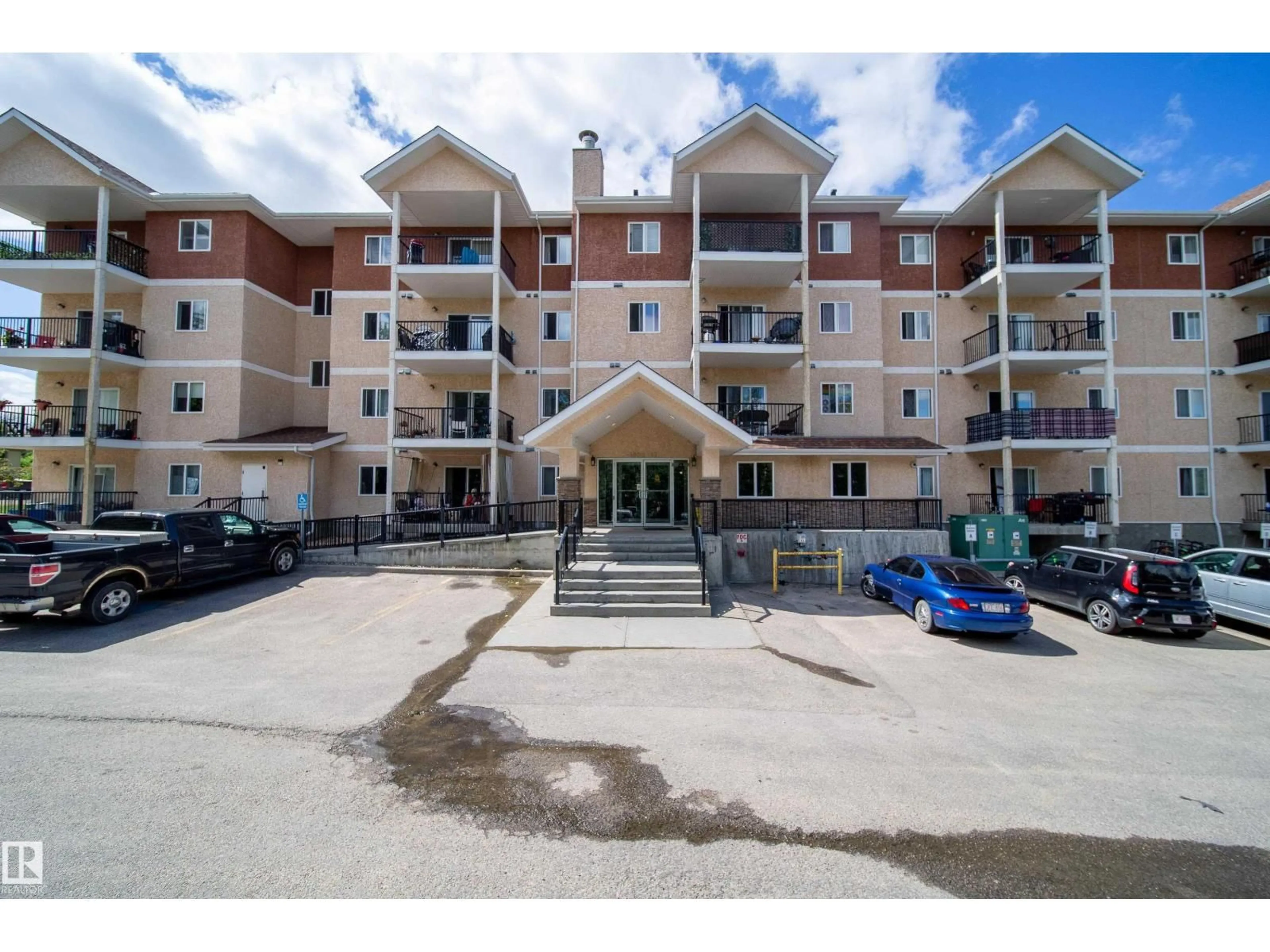 A pic from outside/outdoor area/front of a property/back of a property/a pic from drone, unknown for #401 - 4903 47 AV, Stony Plain Alberta T7Z0C6