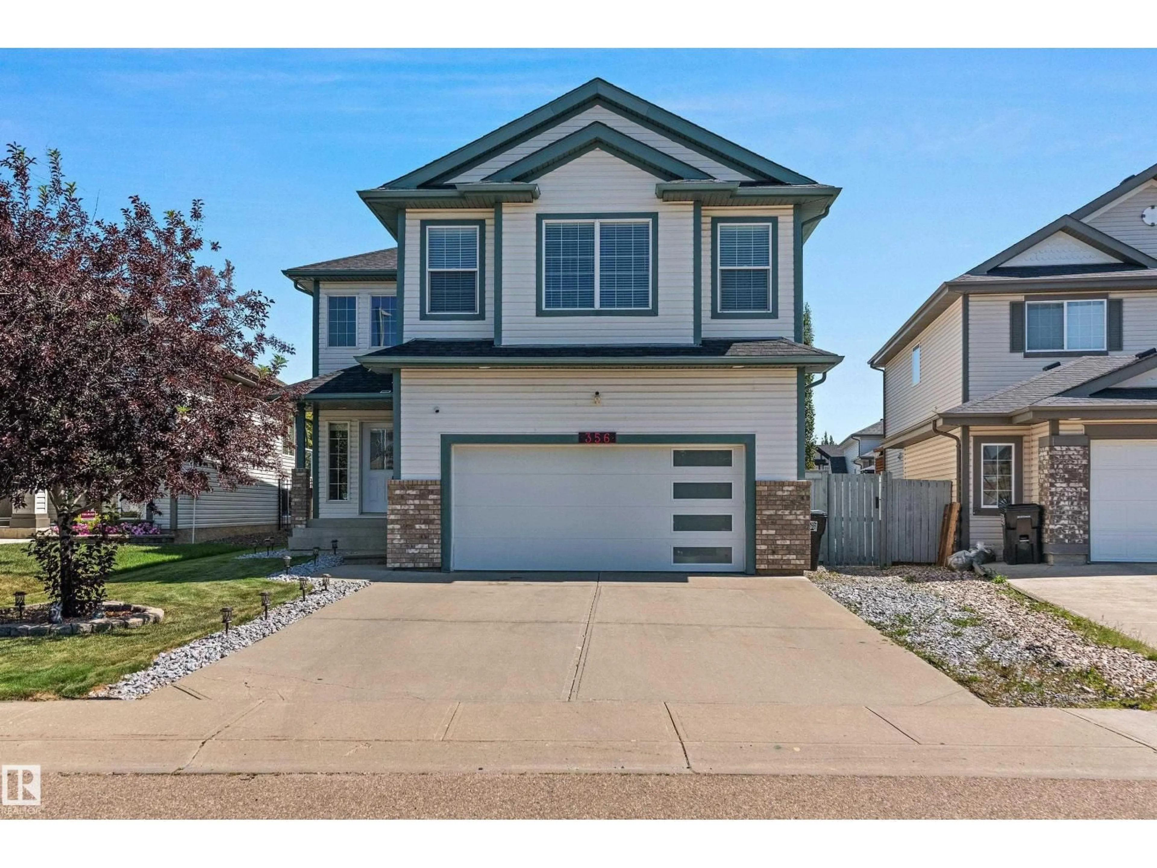 Home with vinyl exterior material, street for NW - 356 CALDERON CR, Edmonton Alberta T6V1R8