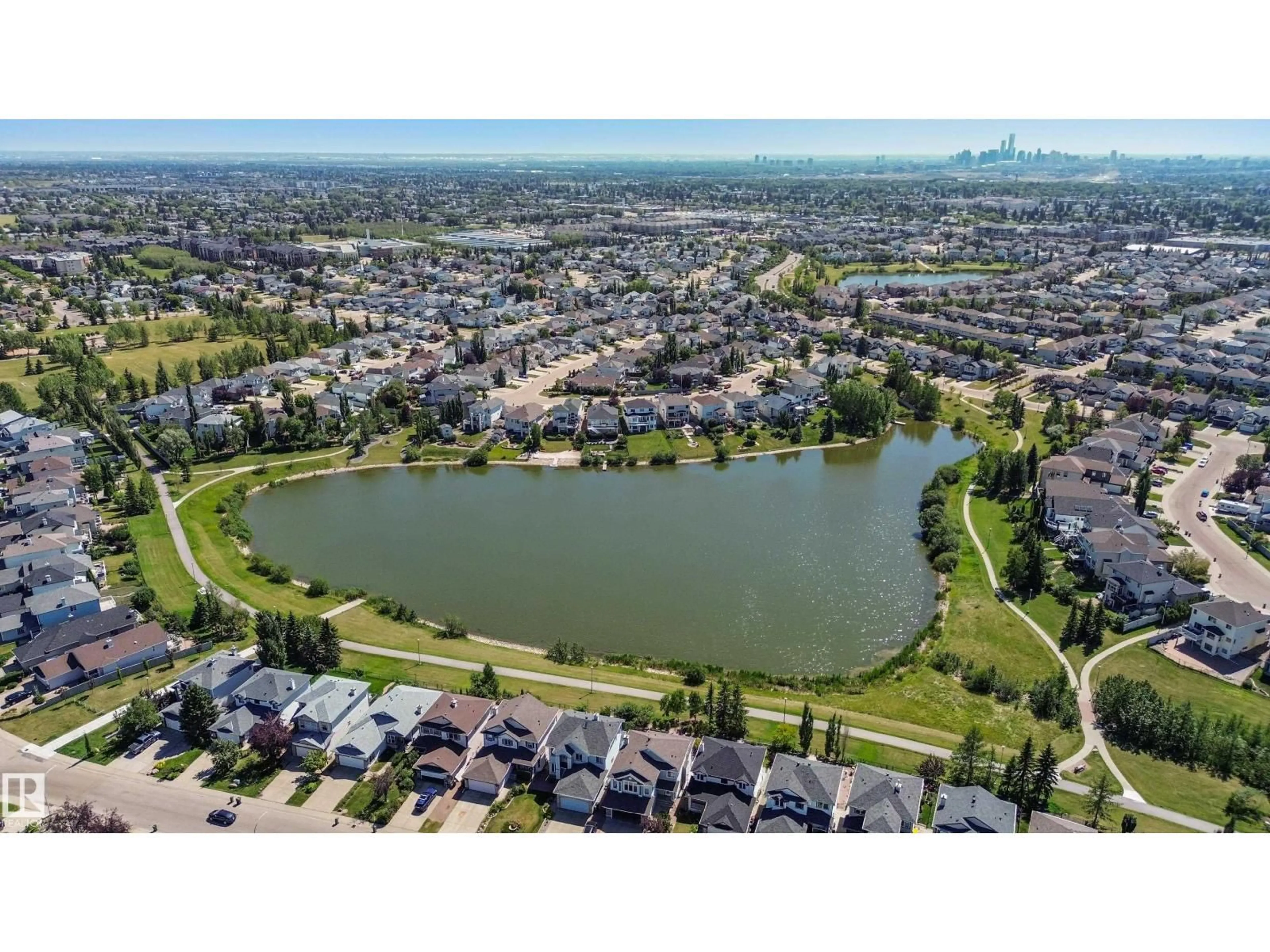 A pic from outside/outdoor area/front of a property/back of a property/a pic from drone, water/lake/river/ocean view for NW - 356 CALDERON CR, Edmonton Alberta T6V1R8