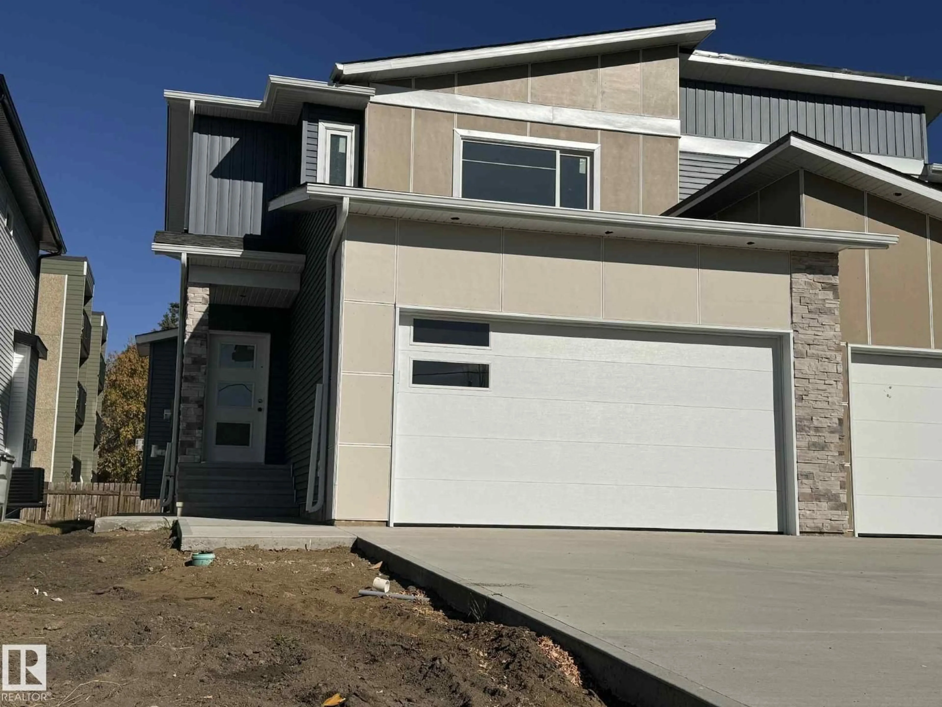 Home with vinyl exterior material, street for 4908 49 AV, Gibbons Alberta T0A1N0