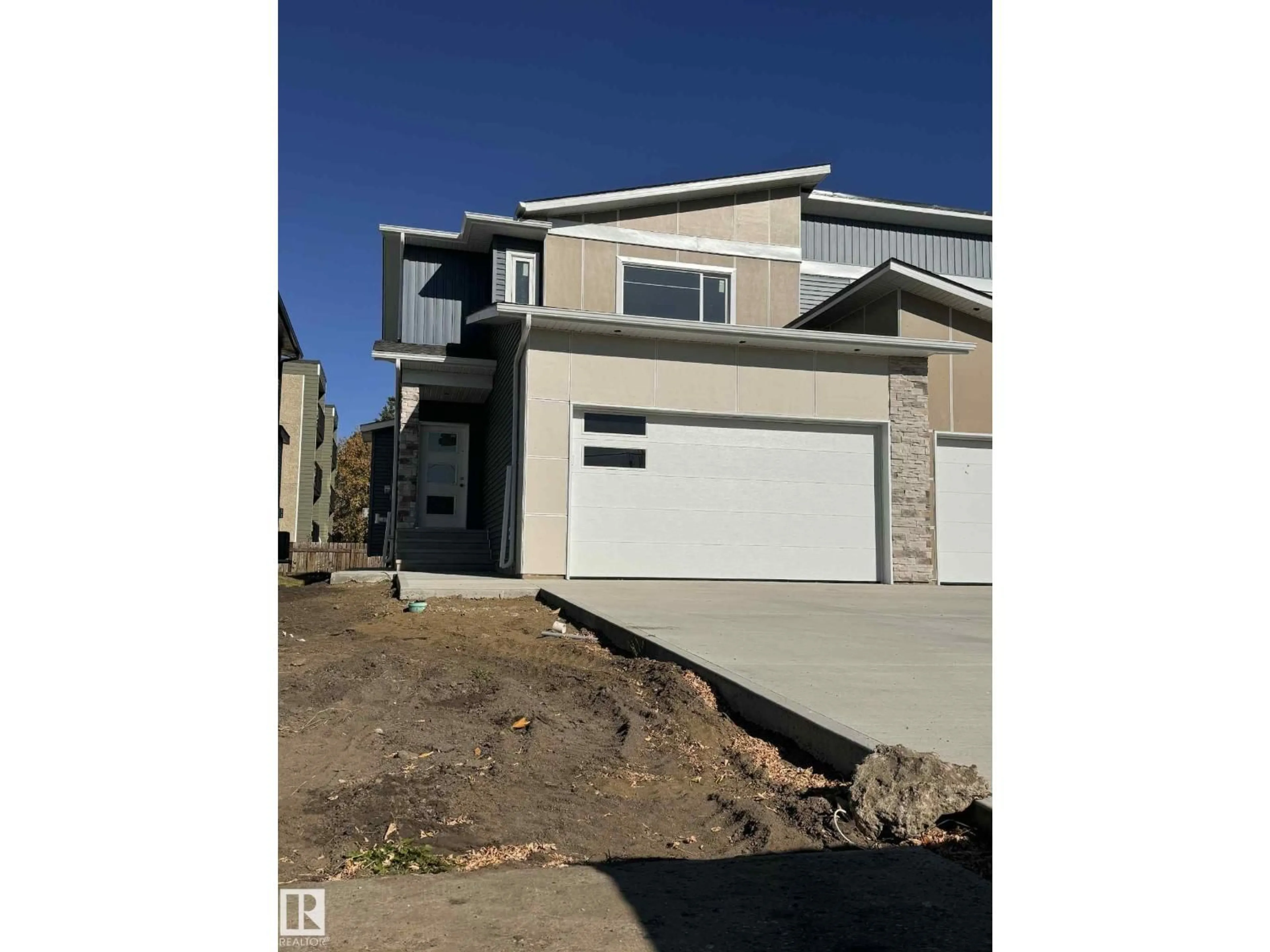 Home with vinyl exterior material, street for 4908 49 AV, Gibbons Alberta T0A1N0