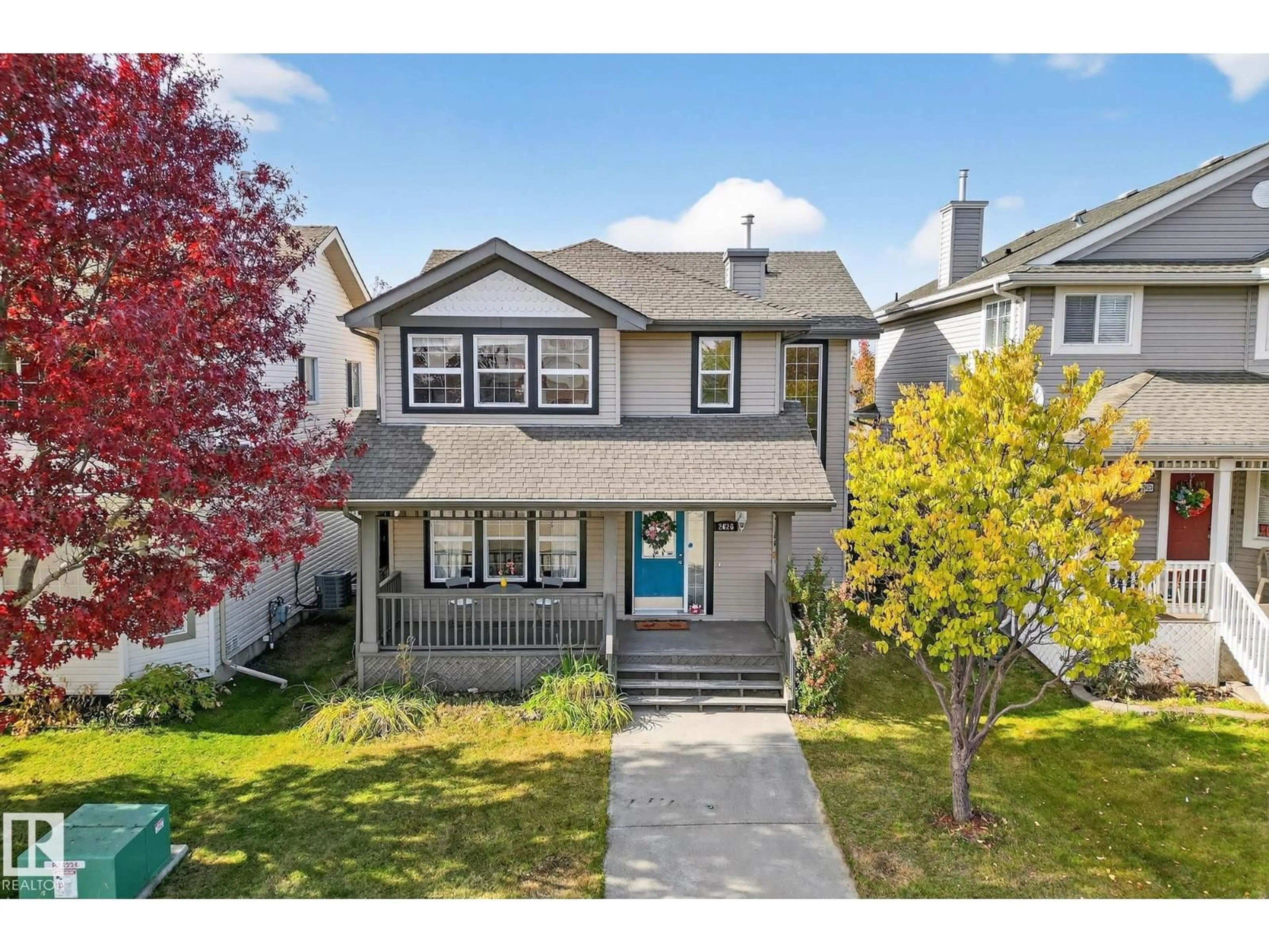 Home with vinyl exterior material, street for 2626 TAYLOR GREEN, Edmonton Alberta T6R3N8