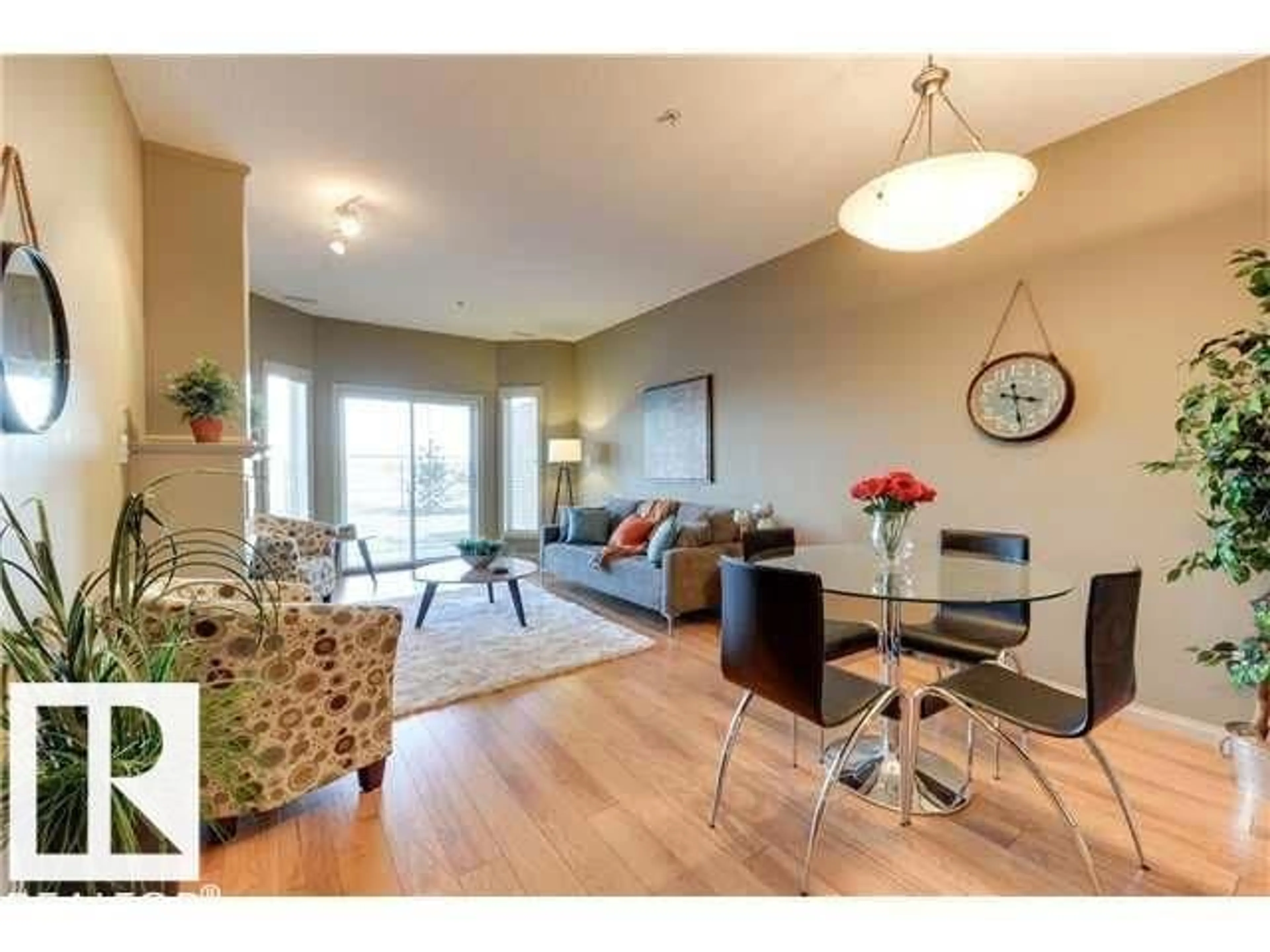 Living room with furniture, wood/laminate floor for #112 - 4312 139 AV, Edmonton Alberta T5Y3J4