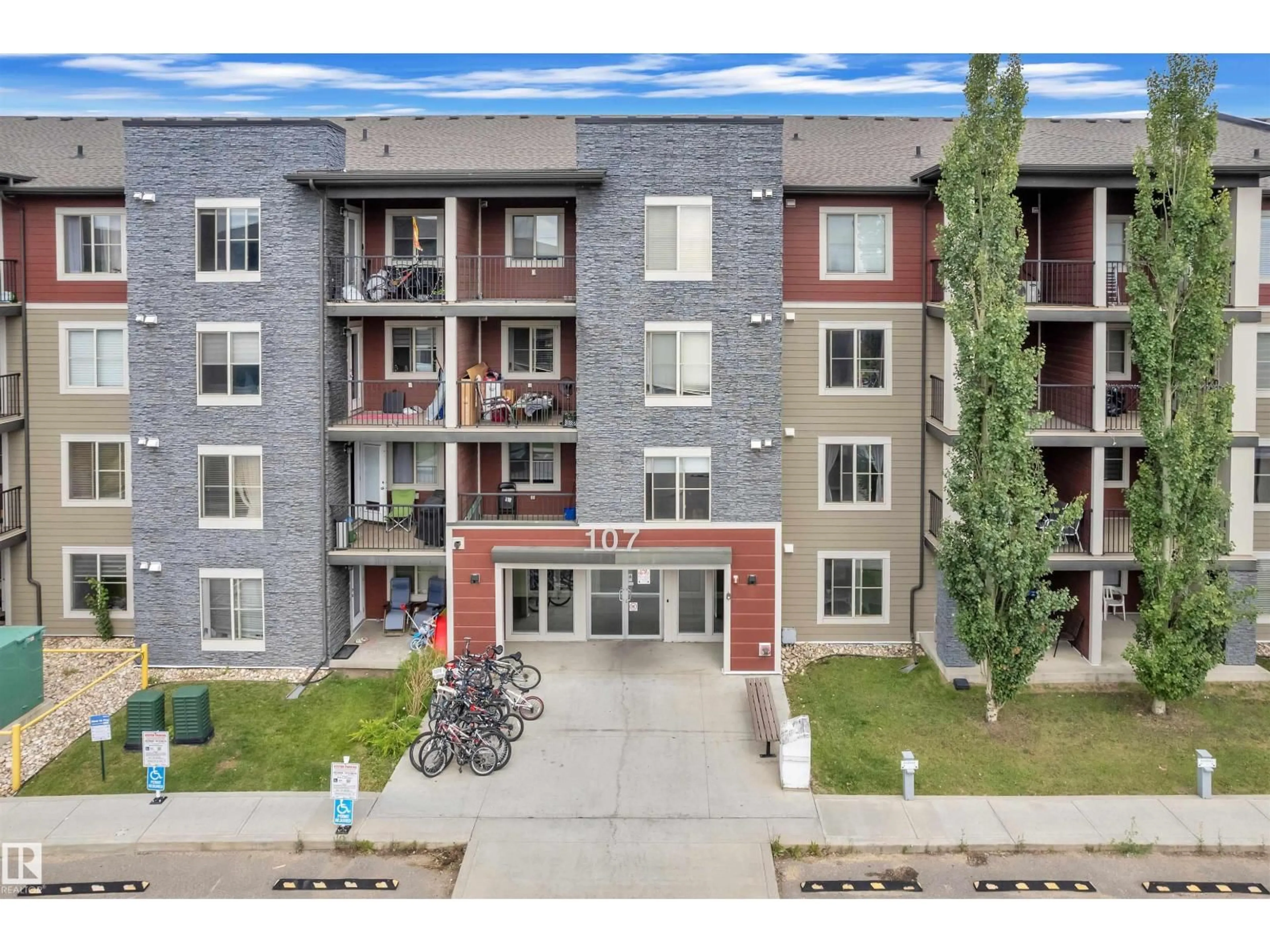 A pic from outside/outdoor area/front of a property/back of a property/a pic from drone, building for #103 - 107 WATT CM, Edmonton Alberta T6X2C6