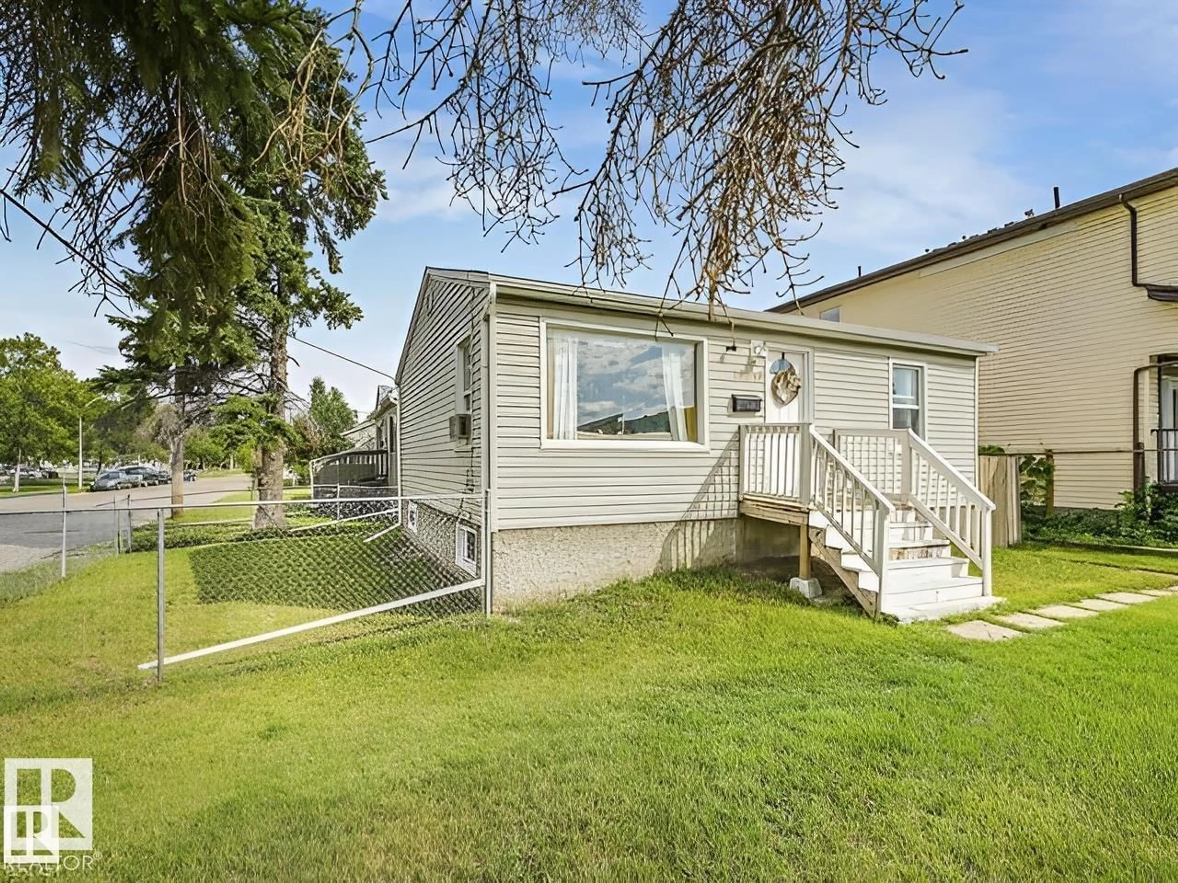 Home with vinyl exterior material, street for 10345 159 ST, Edmonton Alberta T5P3A5