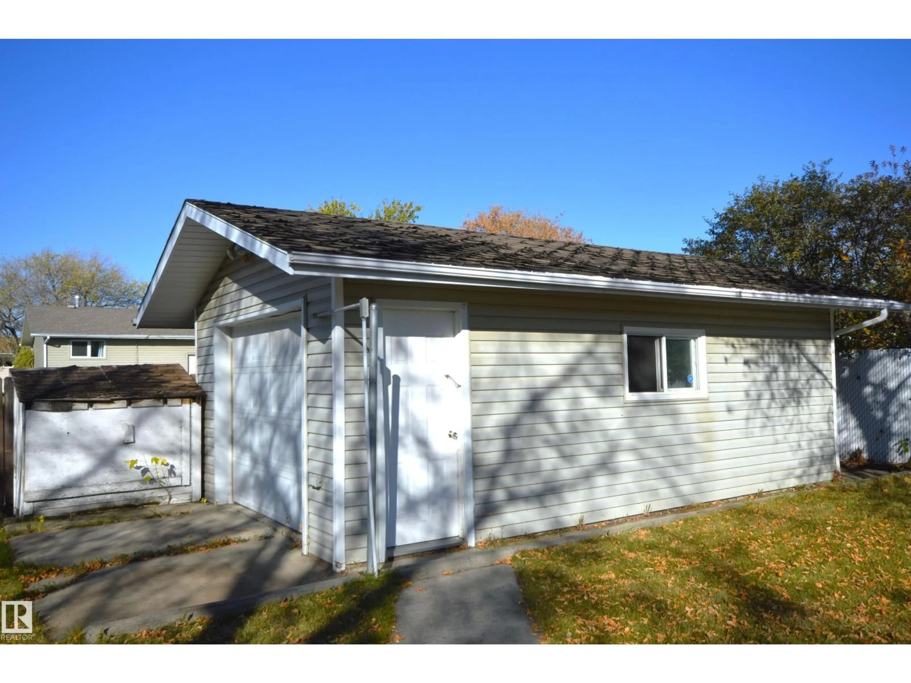 Home with vinyl exterior material, street for 4308 44 ST, Bonnyville Town Alberta T9N1R9