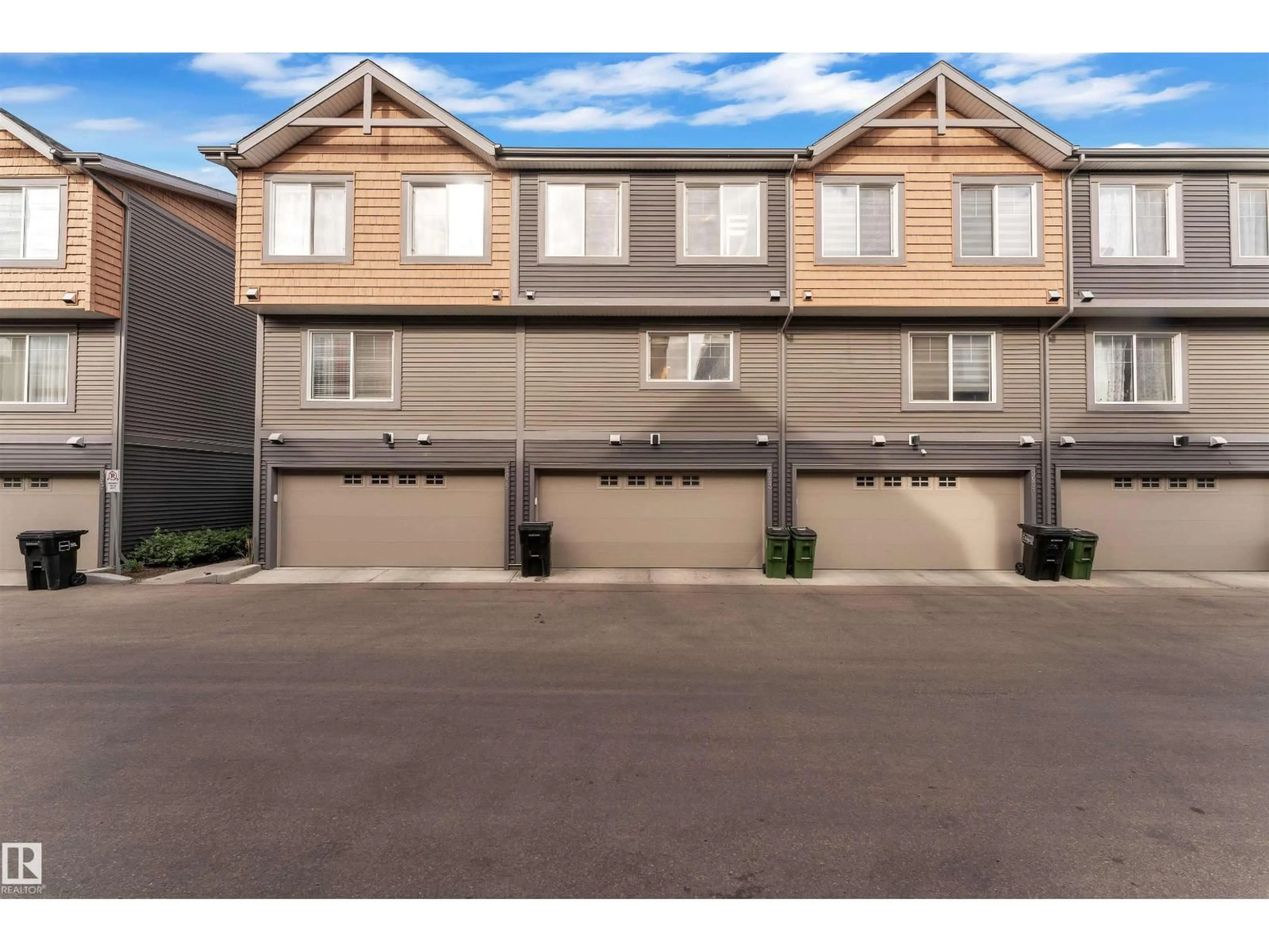 A pic from outside/outdoor area/front of a property/back of a property/a pic from drone, street for NW - 3033 151 AV, Edmonton Alberta T5Y3W4
