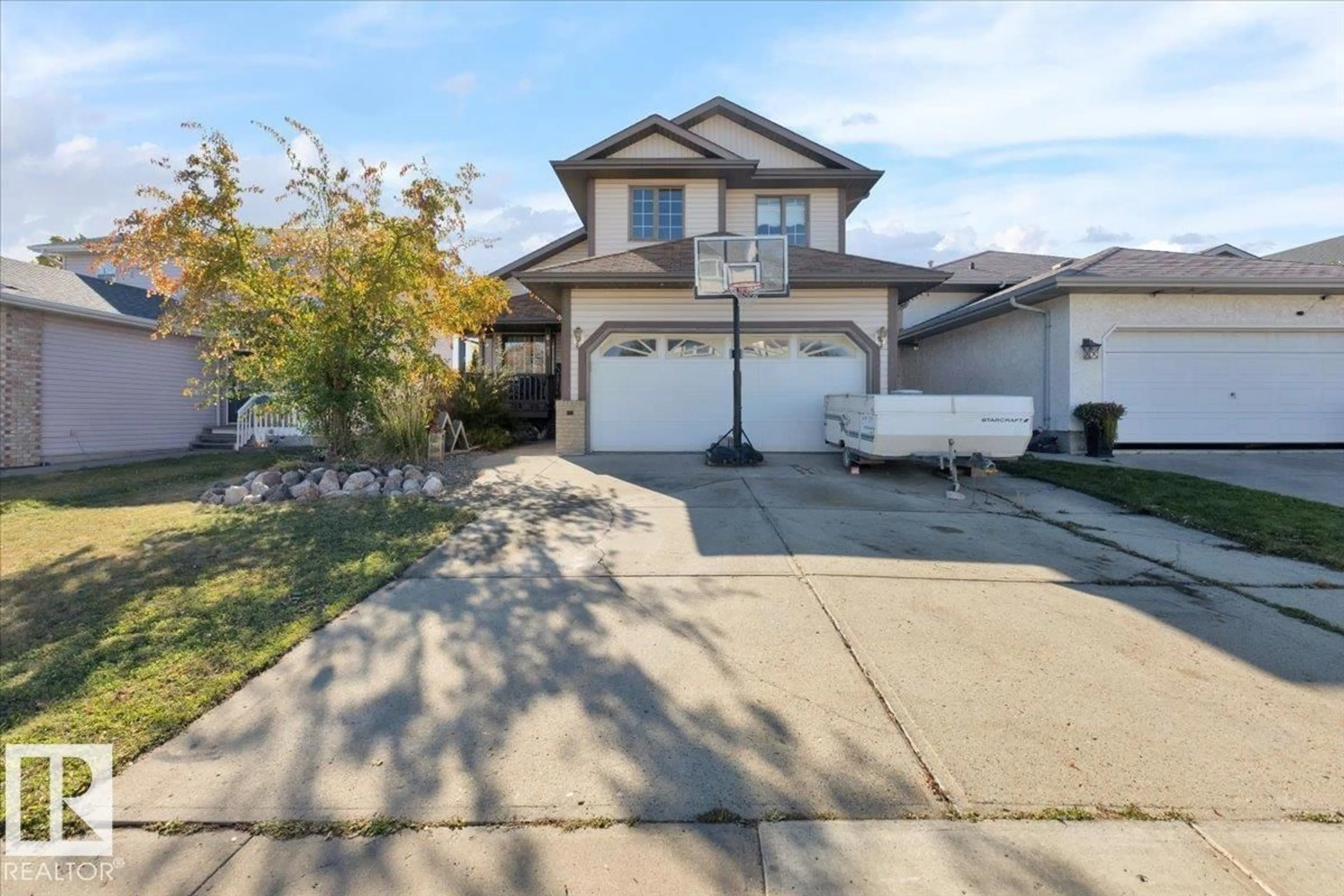 A pic from outside/outdoor area/front of a property/back of a property/a pic from drone, street for 6107 159 AV, Edmonton Alberta T5Y2P4