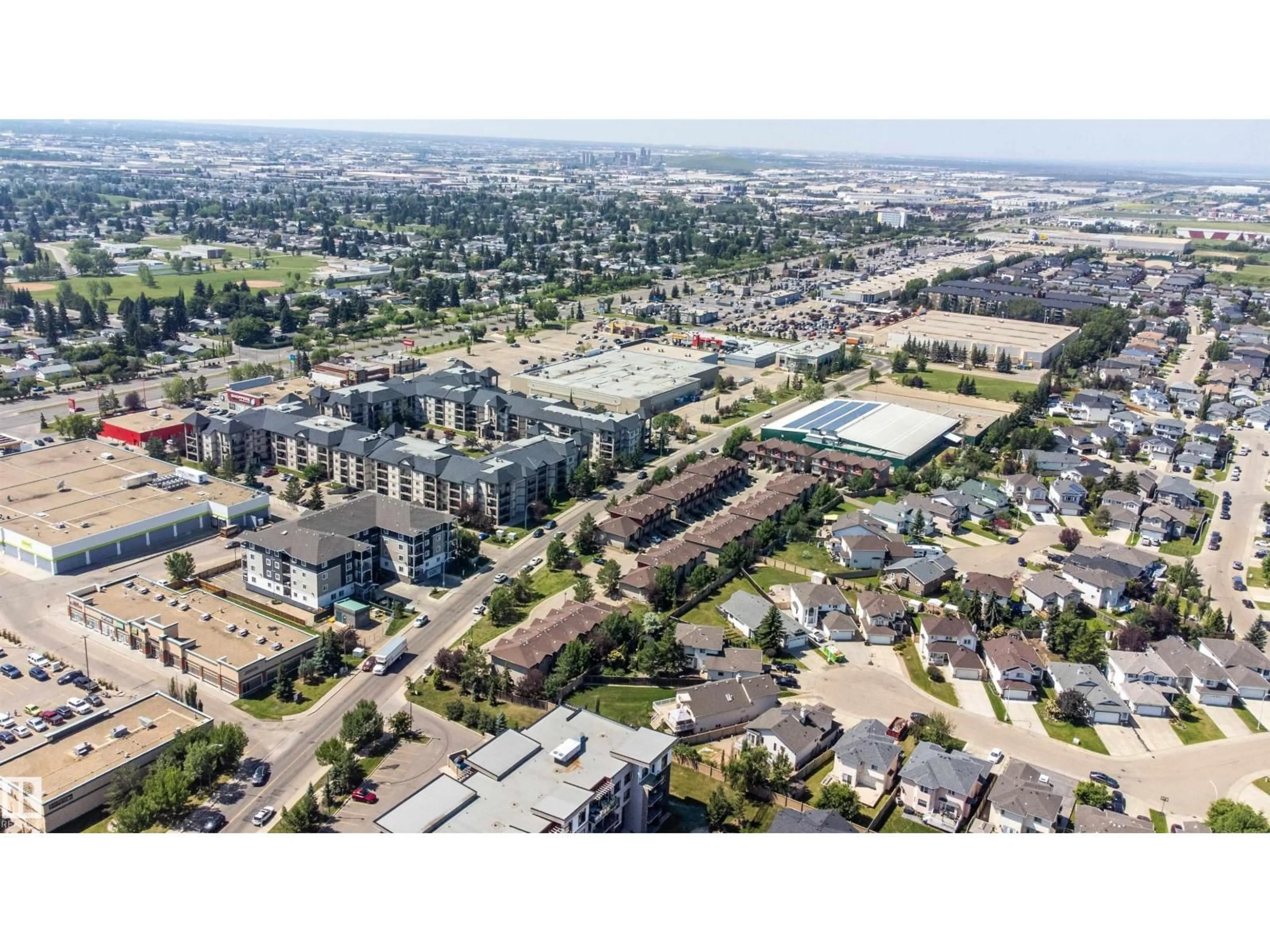 A pic from outside/outdoor area/front of a property/back of a property/a pic from drone, street for #12 - 12930 140 AV, Edmonton Alberta T6V0C4